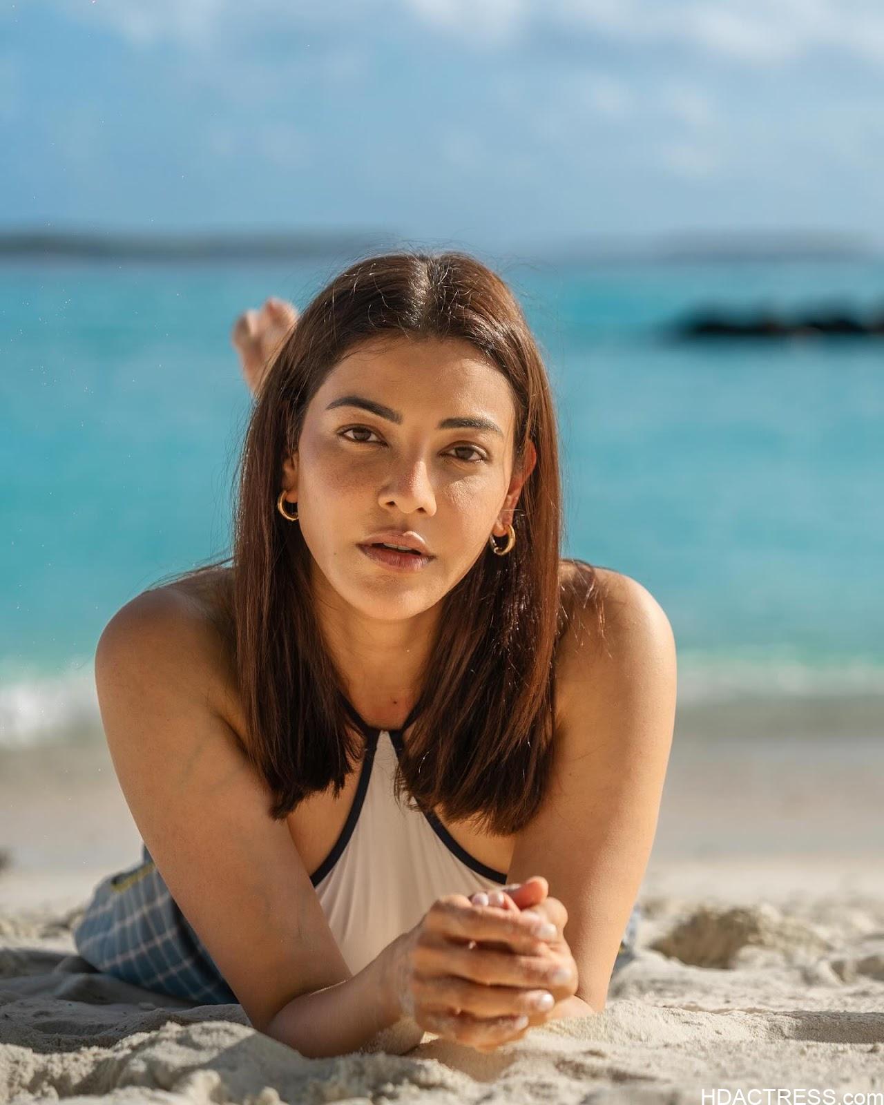 Kajal Aggarwal & Nisha Aggarwal Flaunt Their Curves in Bikini Sensational Swimwear - Image 3 Kajal Aggarwal & Nisha Aggarwal Flaunt Their Curves in Bikini Sensational Swimwear - Image 3