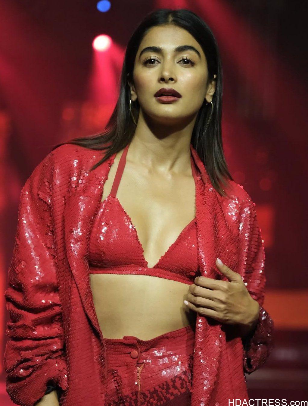 Pooja Hegde Flaunts Her Curves in a Sexy Red Bra Top – Photos You Can’t Miss - Image 1