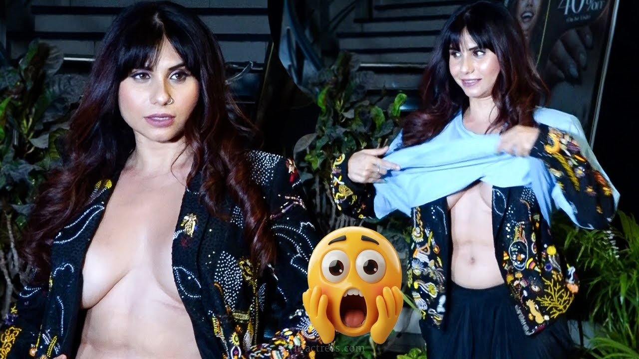 Tania Chatterjee removing dress Taniya Chatterjee Suddenly Started Taking Off Her Clothes In Public Place During Photoshoot - Image 1