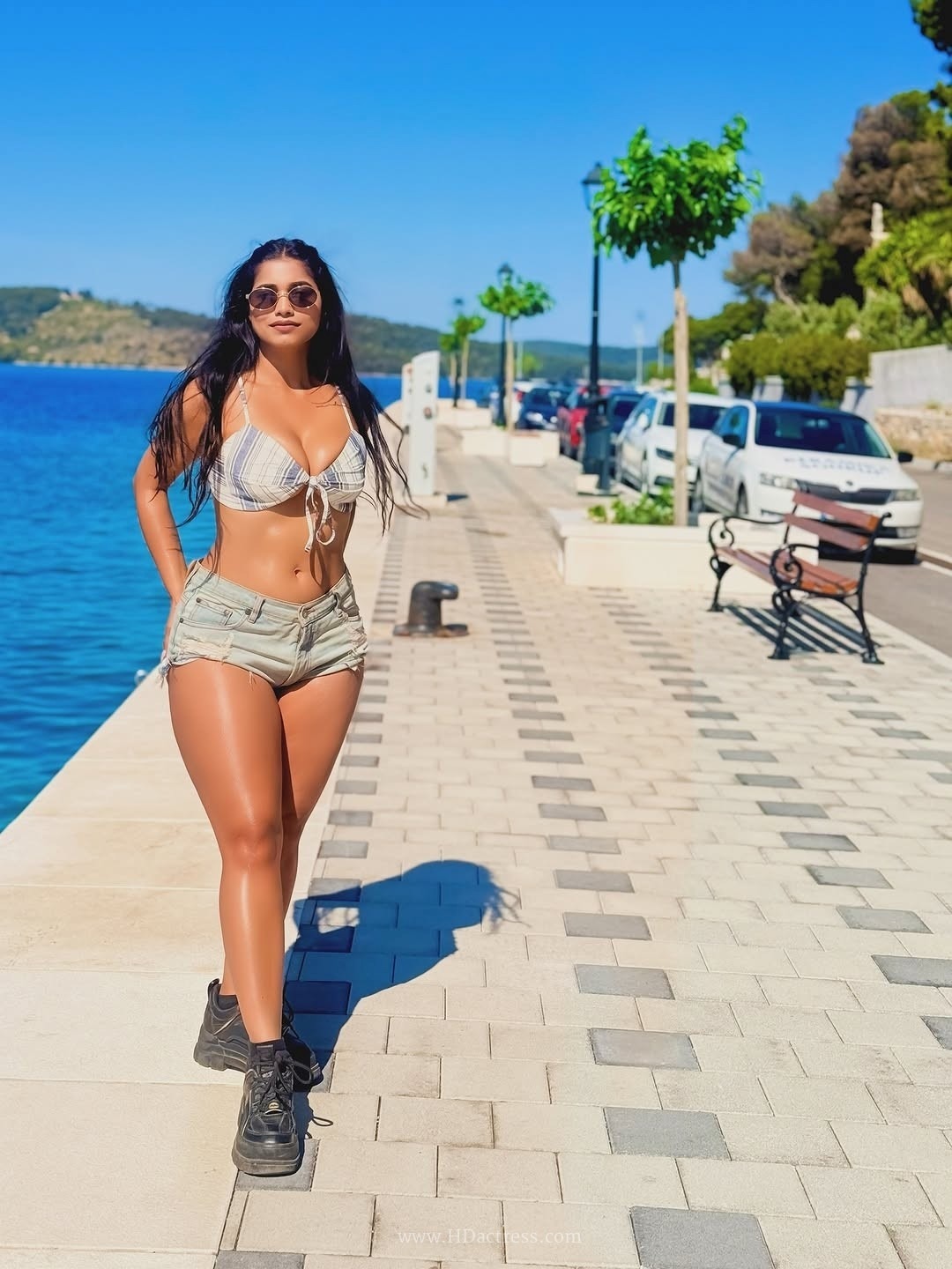 Pratika sood turns heads in front-tie halter top with denim shorts.. - Image 3 Pratika sood turns heads in front-tie halter top with denim shorts.. - Image 3