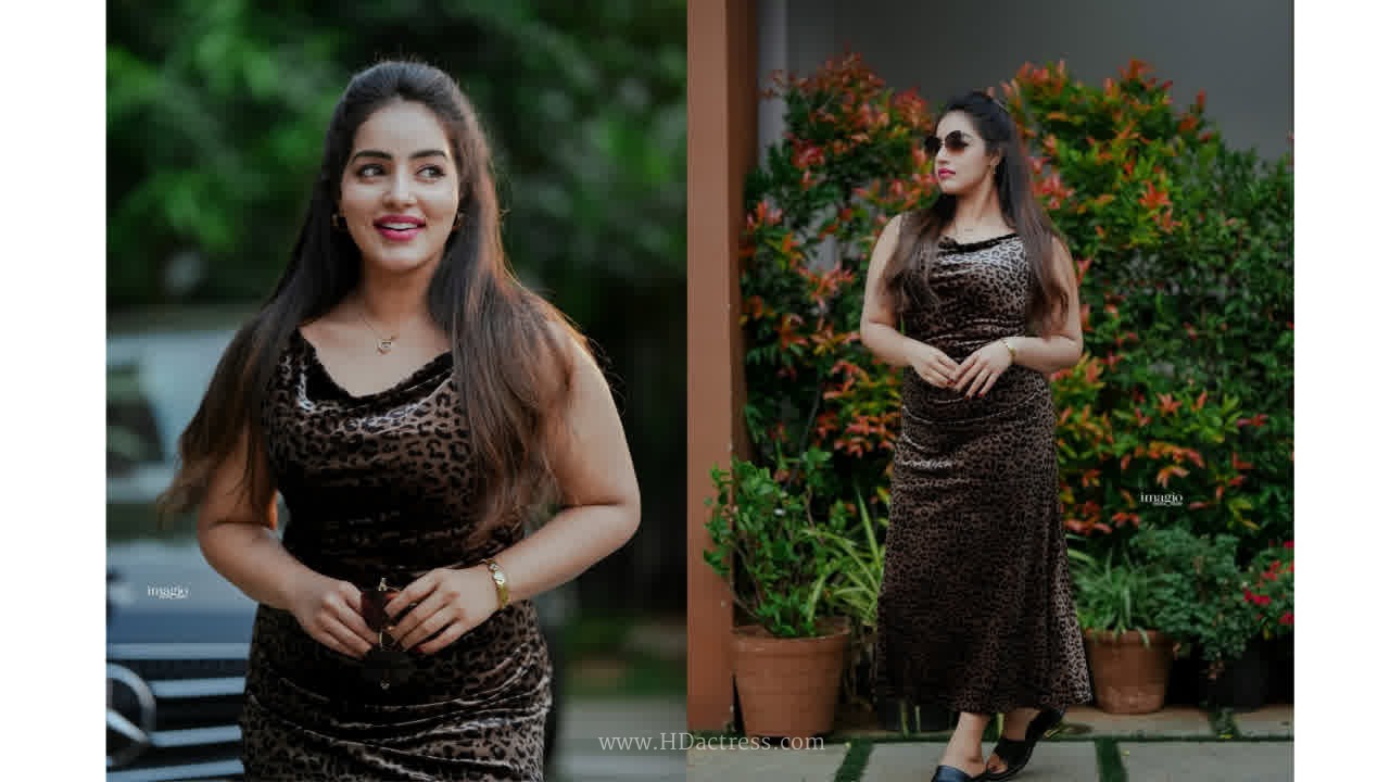 Malavika menon stunning looks in a leopard print sleeveless gown..