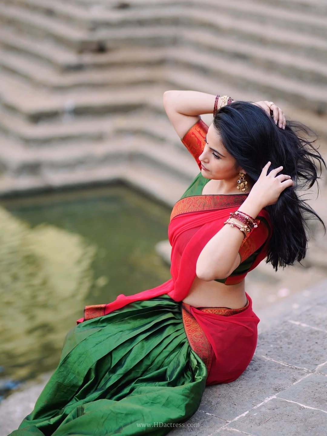 Digital star pratibha choudhary sizzling outdoor photoshoot in green & red dhavani.. - Image 2 Digital star pratibha choudhary sizzling outdoor photoshoot in green & red dhavani.. - Image 2