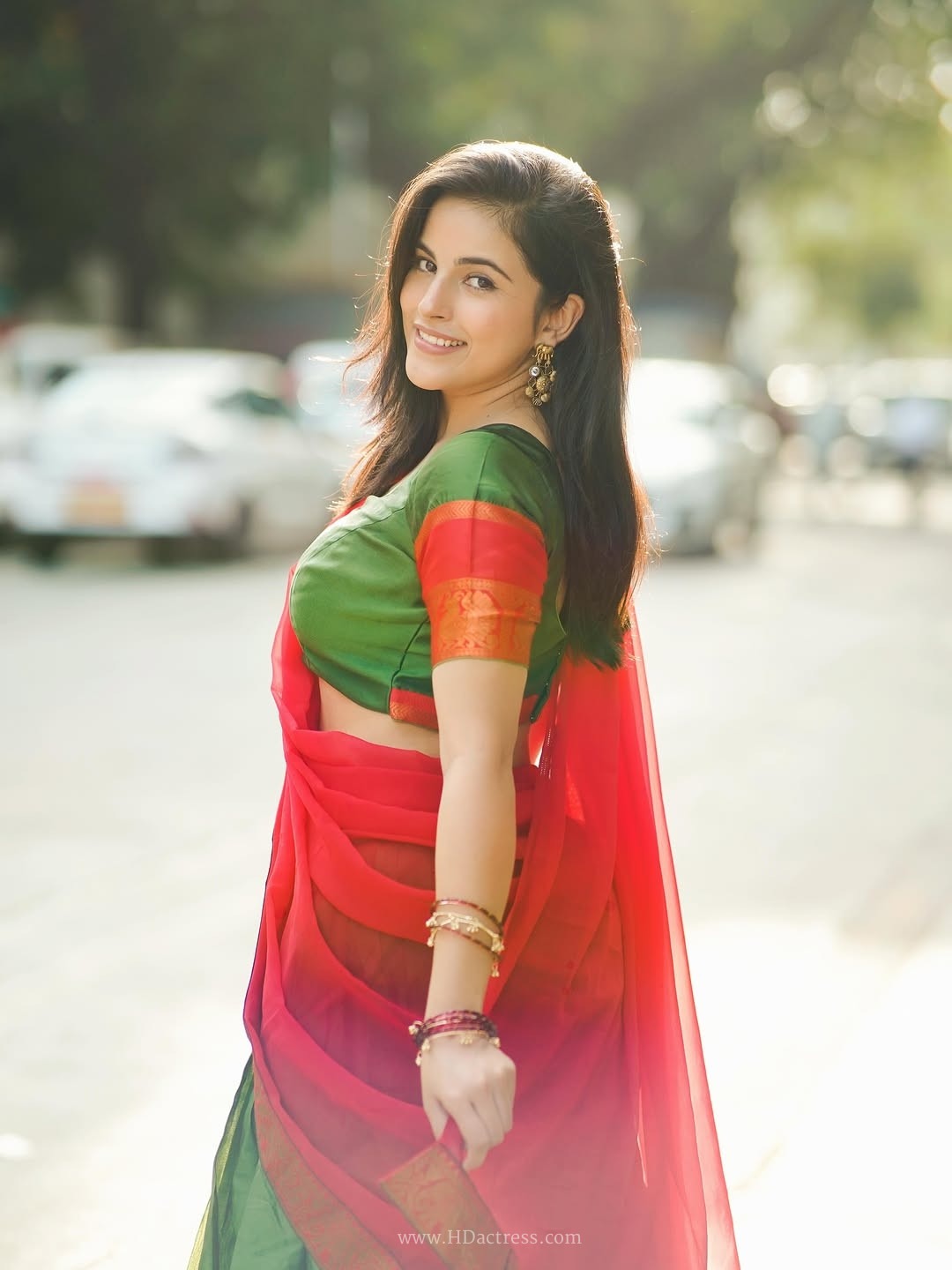 Digital star pratibha choudhary sizzling outdoor photoshoot in green & red dhavani.. - Image 3 Digital star pratibha choudhary sizzling outdoor photoshoot in green & red dhavani.. - Image 3