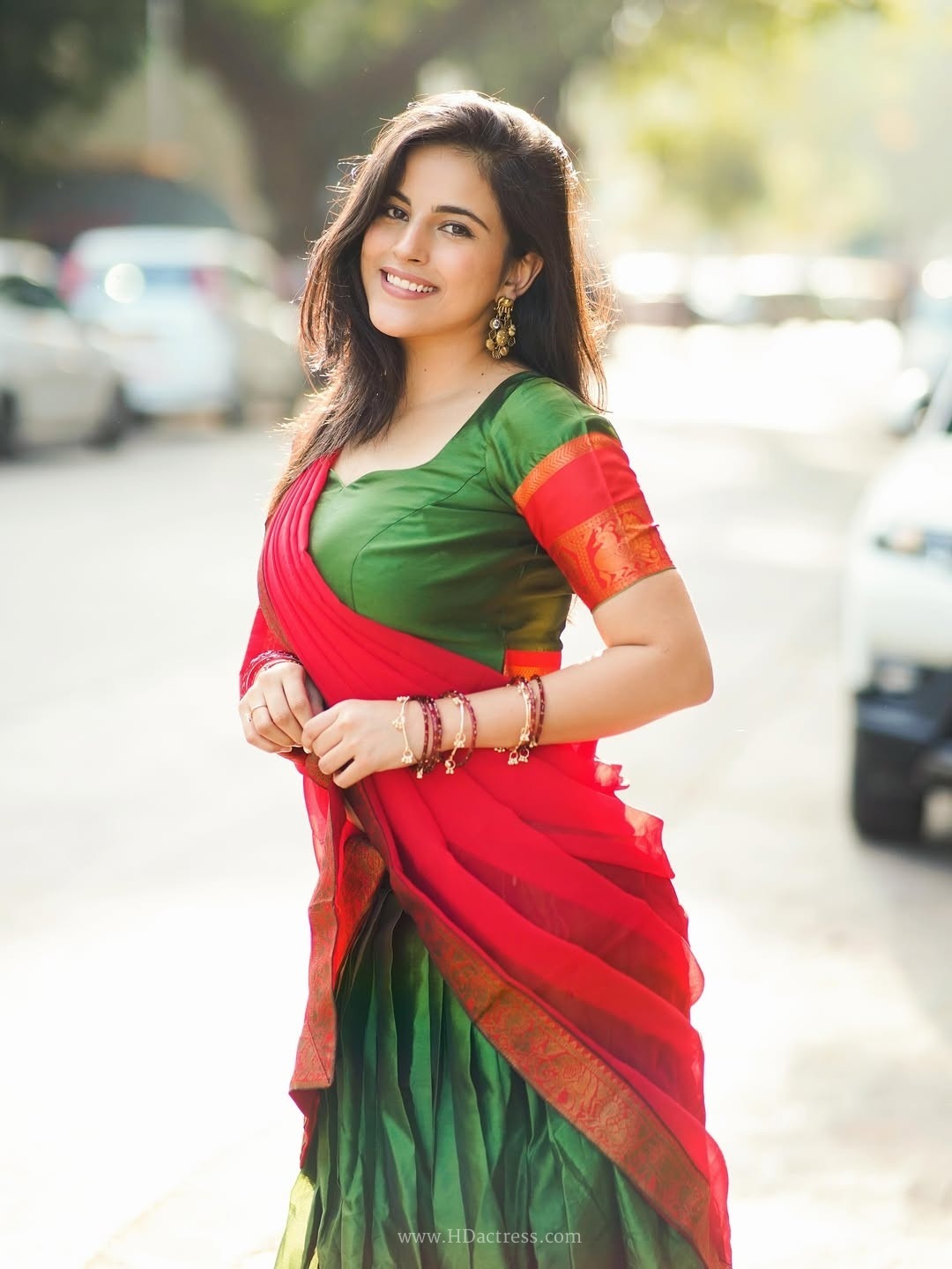 Digital star pratibha choudhary sizzling outdoor photoshoot in green & red dhavani.. - Image 5 Digital star pratibha choudhary sizzling outdoor photoshoot in green & red dhavani.. - Image 5
