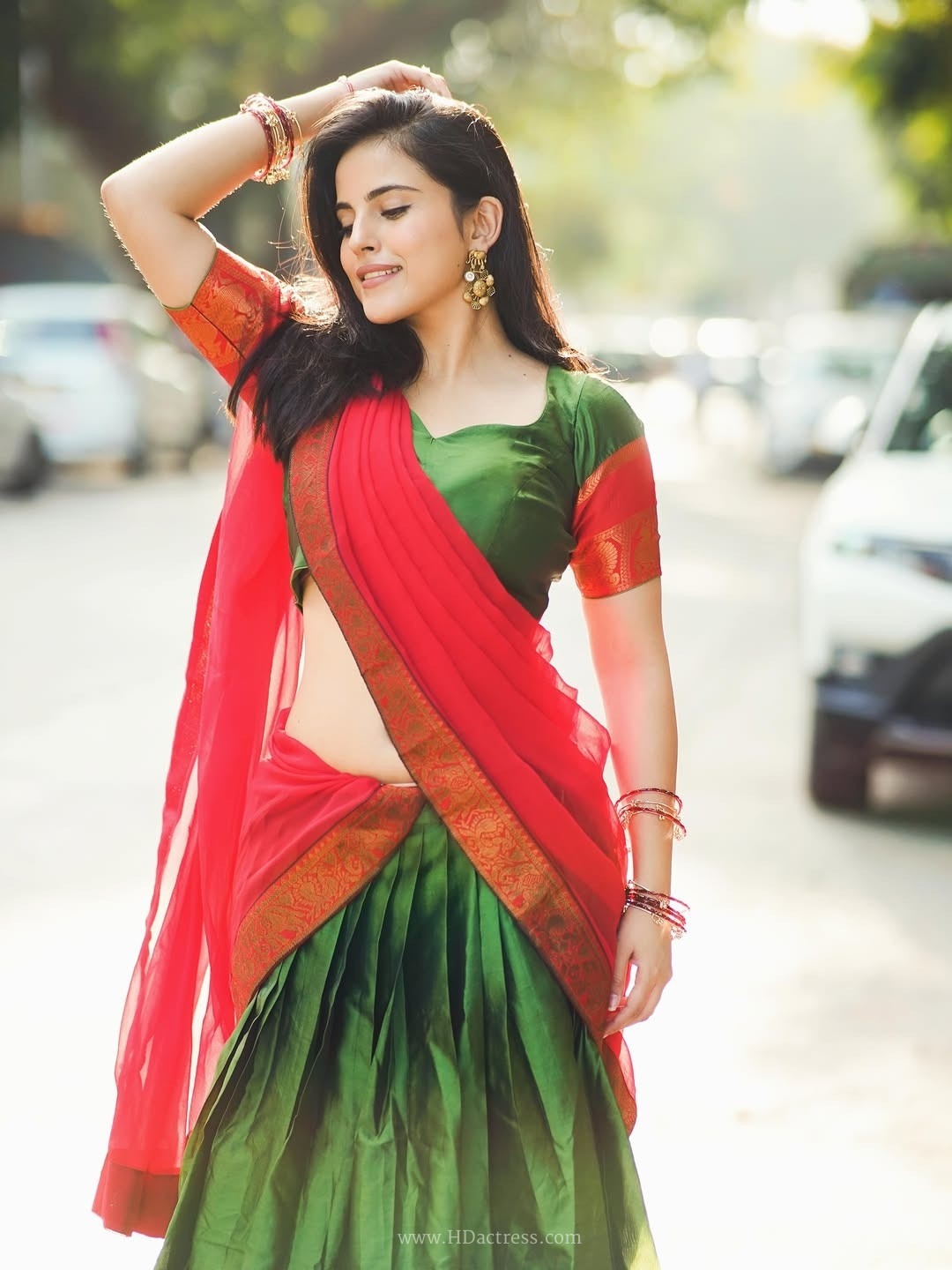Digital star pratibha choudhary sizzling outdoor photoshoot in green & red dhavani.. - Image 9 Digital star pratibha choudhary sizzling outdoor photoshoot in green & red dhavani.. - Image 9
