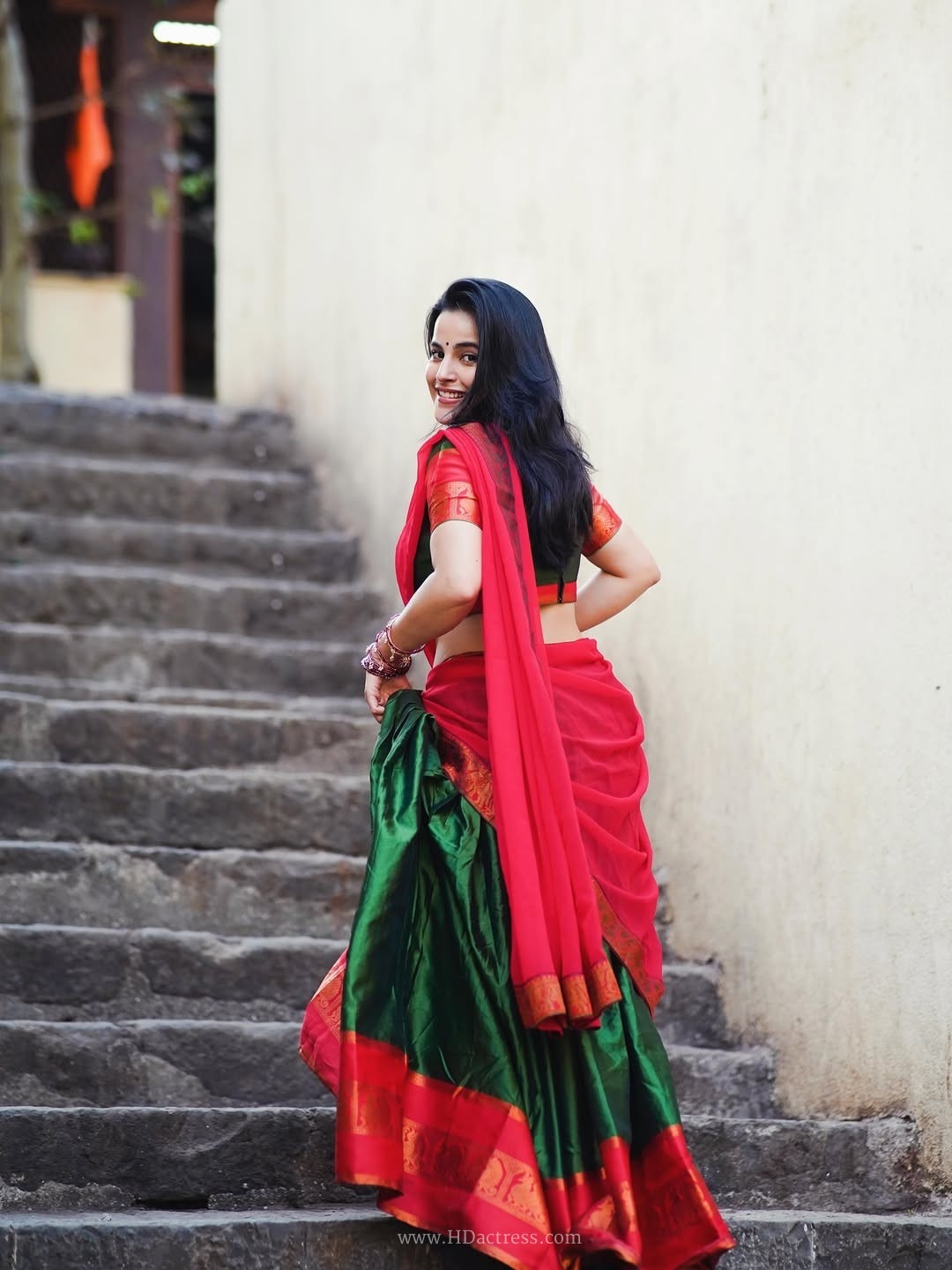 Digital star pratibha choudhary sizzling outdoor photoshoot in green & red dhavani.. - Image 10 Digital star pratibha choudhary sizzling outdoor photoshoot in green & red dhavani.. - Image 10