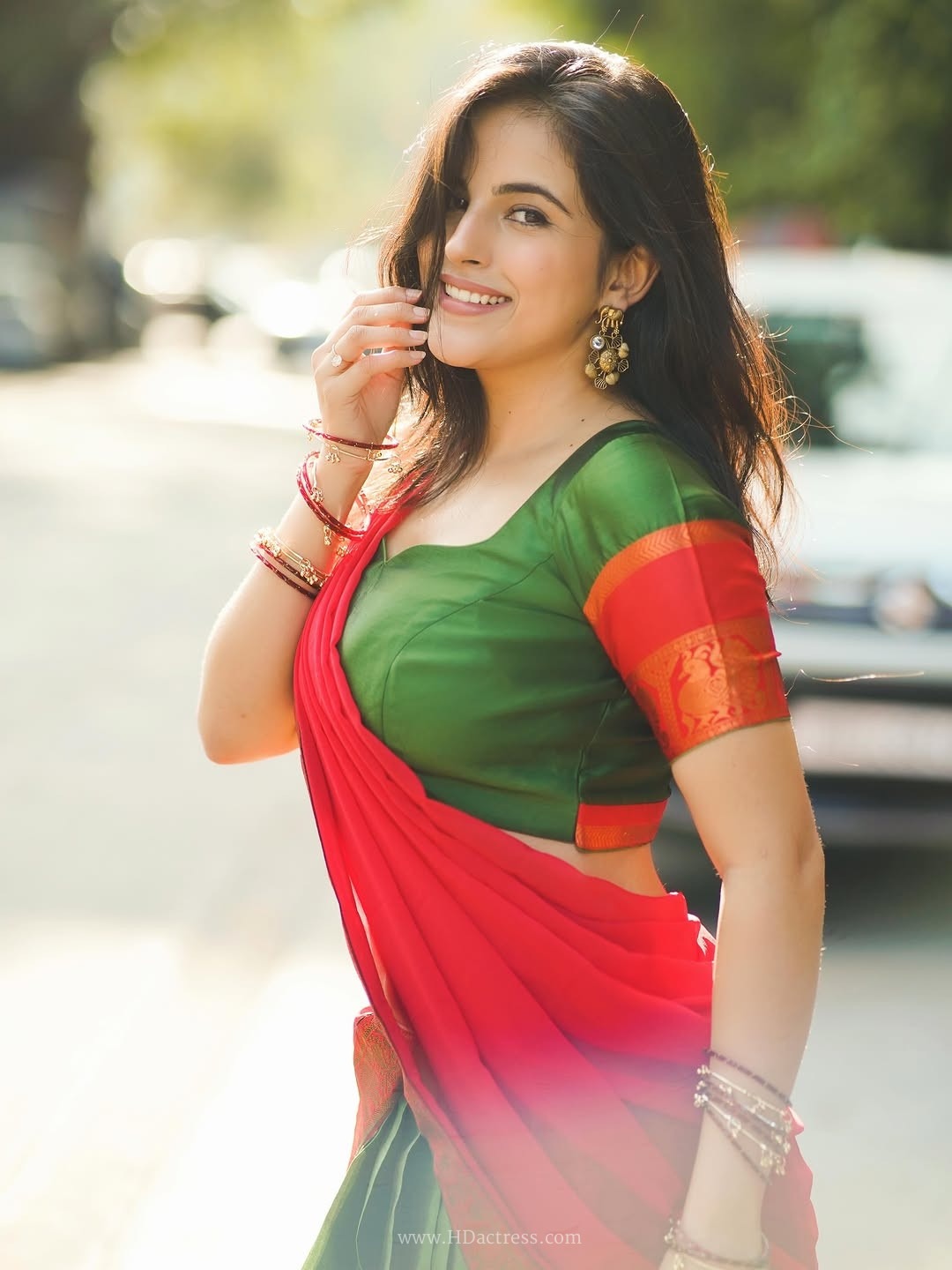 Digital star pratibha choudhary sizzling outdoor photoshoot in green & red dhavani.. - Image 11 Digital star pratibha choudhary sizzling outdoor photoshoot in green & red dhavani.. - Image 11