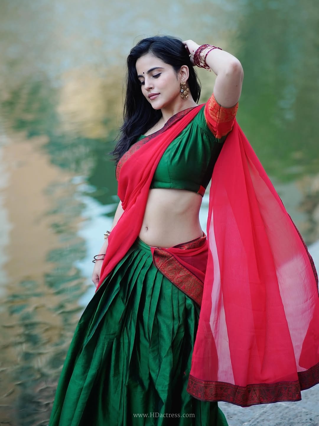 Digital star pratibha choudhary sizzling outdoor photoshoot in green & red dhavani.. - Image 14 Digital star pratibha choudhary sizzling outdoor photoshoot in green & red dhavani.. - Image 14