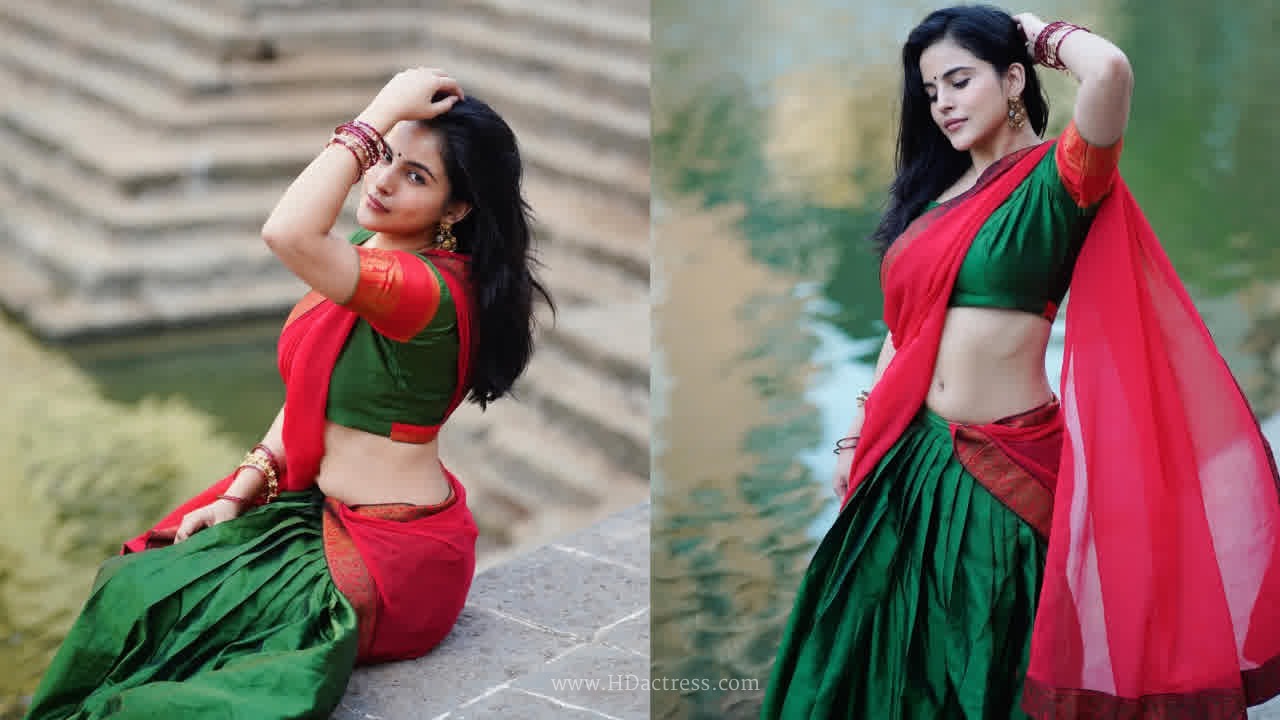 Digital star pratibha choudhary sizzling outdoor photoshoot in green & red dhavani..