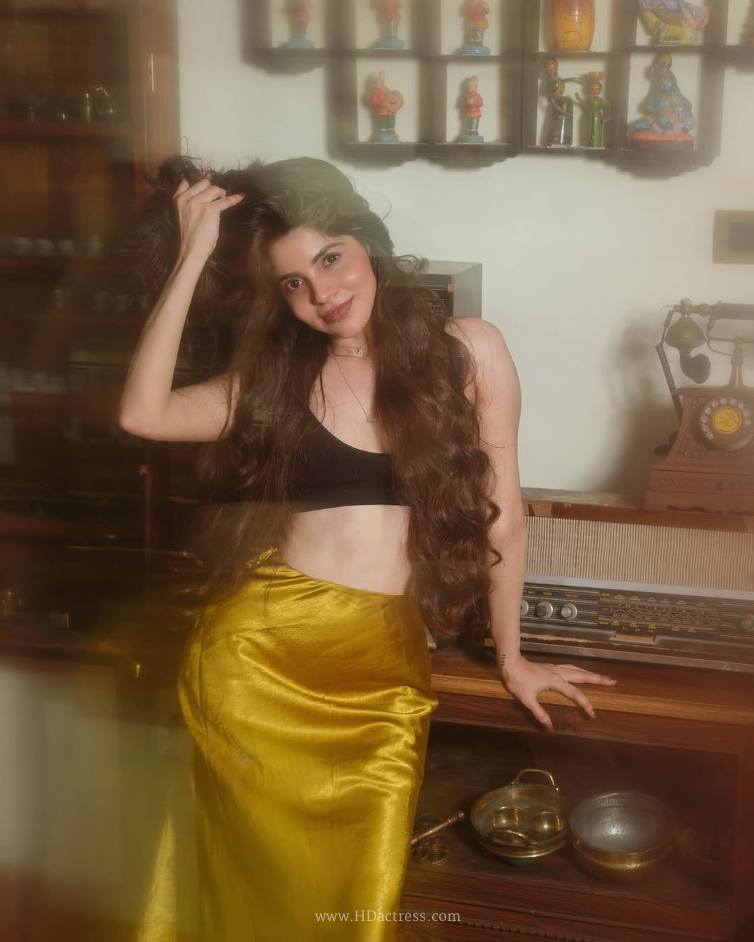 Divya bharathi’s striking retro vibe poses in bold crop top and silk skirt.. - Image 3 Divya bharathi’s striking retro vibe poses in bold crop top and silk skirt.. - Image 3