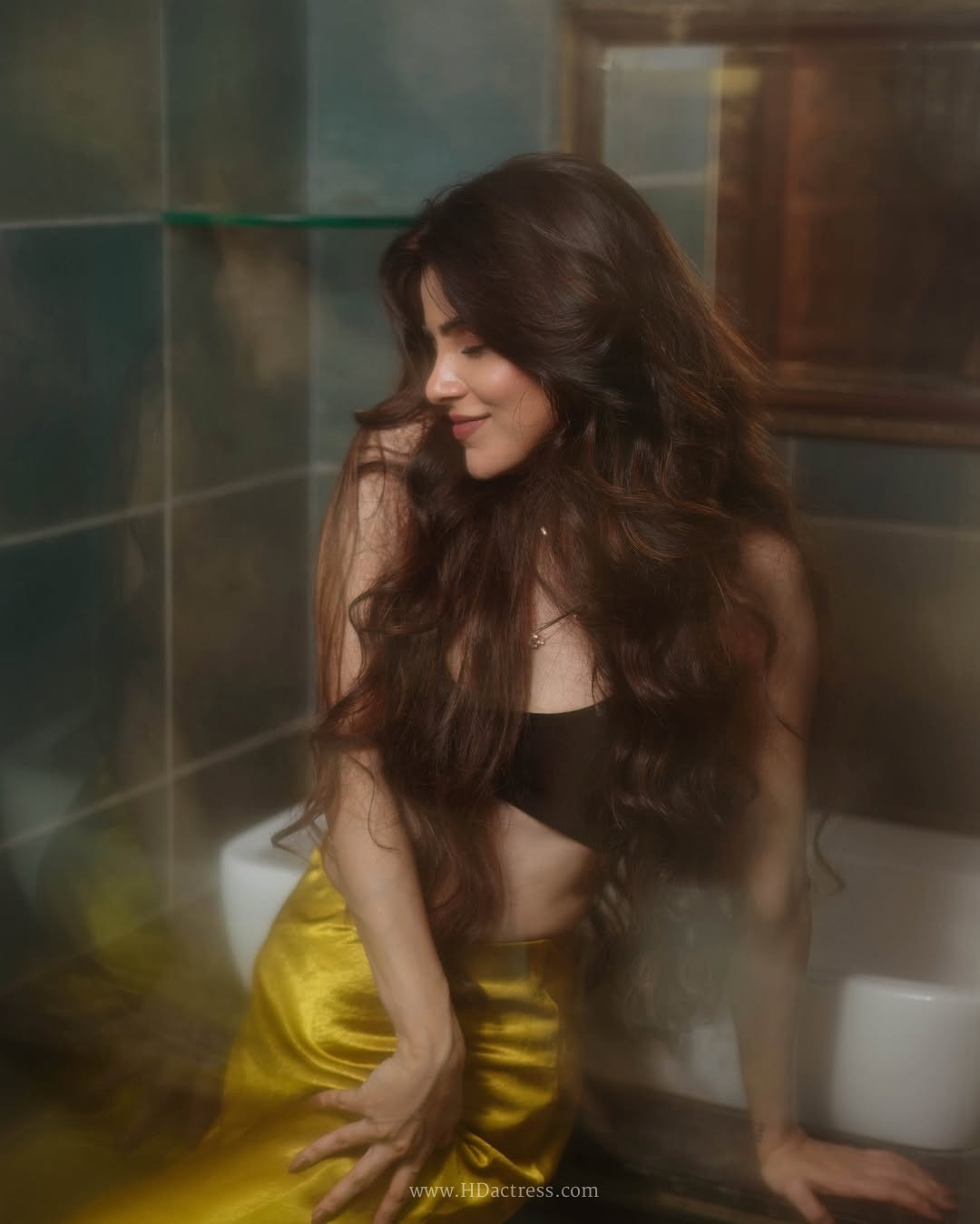 Divya bharathi’s striking retro vibe poses in bold crop top and silk skirt.. - Image 6 Divya bharathi’s striking retro vibe poses in bold crop top and silk skirt.. - Image 6