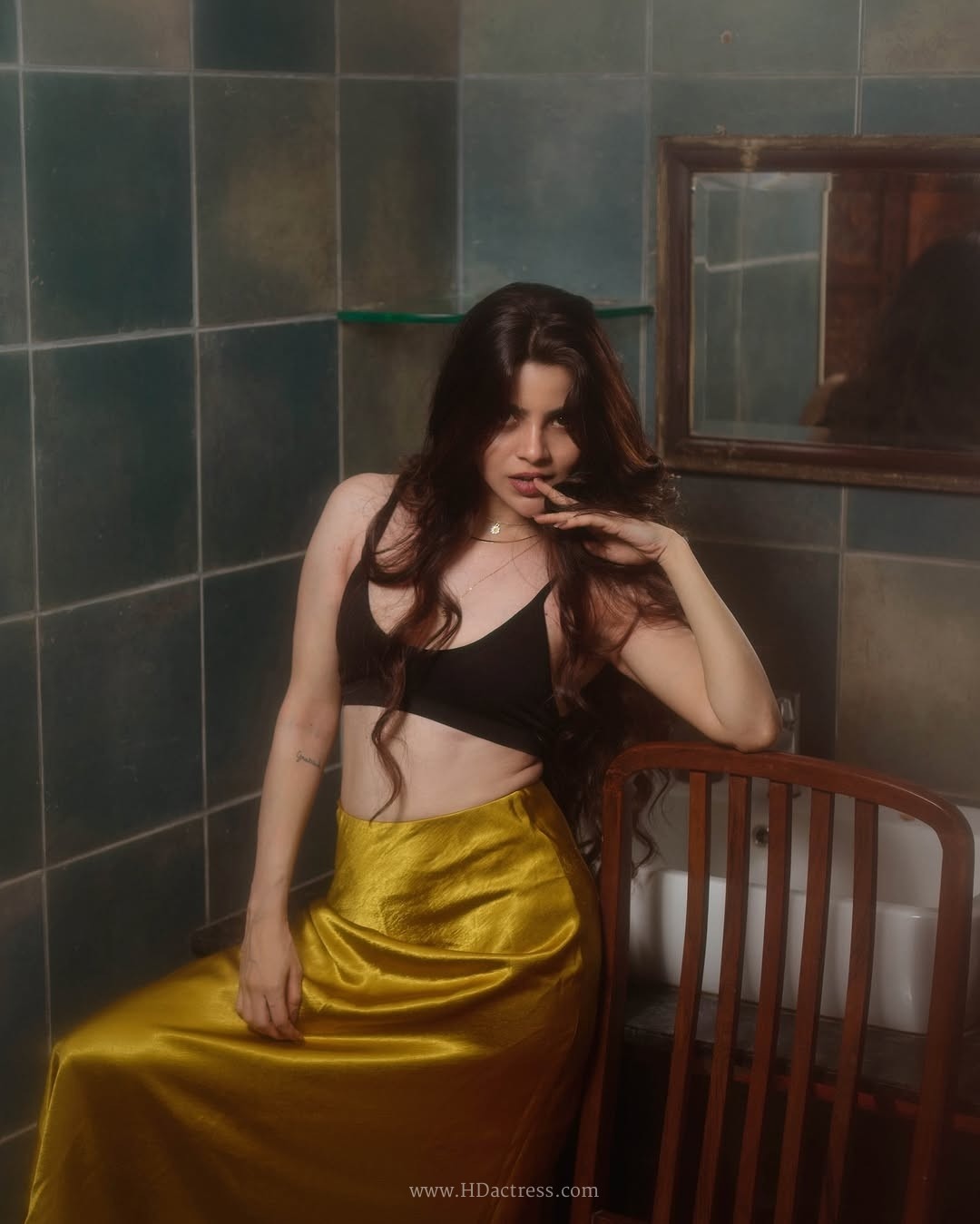 Divya bharathi’s striking retro vibe poses in bold crop top and silk skirt.. - Image 9 Divya bharathi’s striking retro vibe poses in bold crop top and silk skirt.. - Image 9