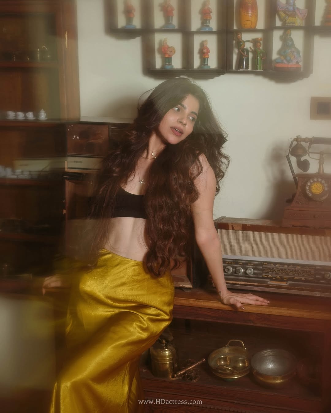 Divya bharathi’s striking retro vibe poses in bold crop top and silk skirt.. - Image 12 Divya bharathi’s striking retro vibe poses in bold crop top and silk skirt.. - Image 12