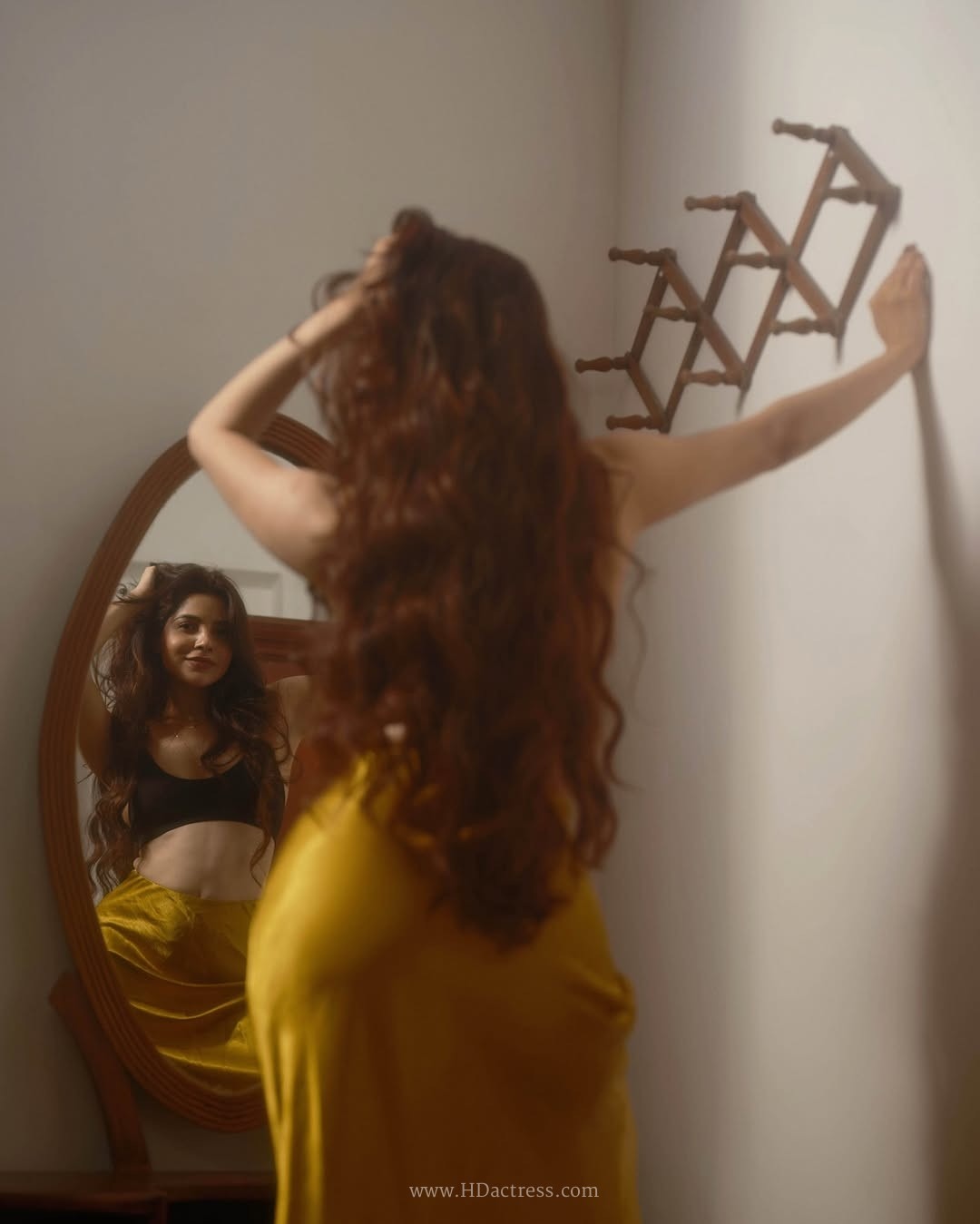 Divya bharathi’s striking retro vibe poses in bold crop top and silk skirt.. - Image 15 Divya bharathi’s striking retro vibe poses in bold crop top and silk skirt.. - Image 15