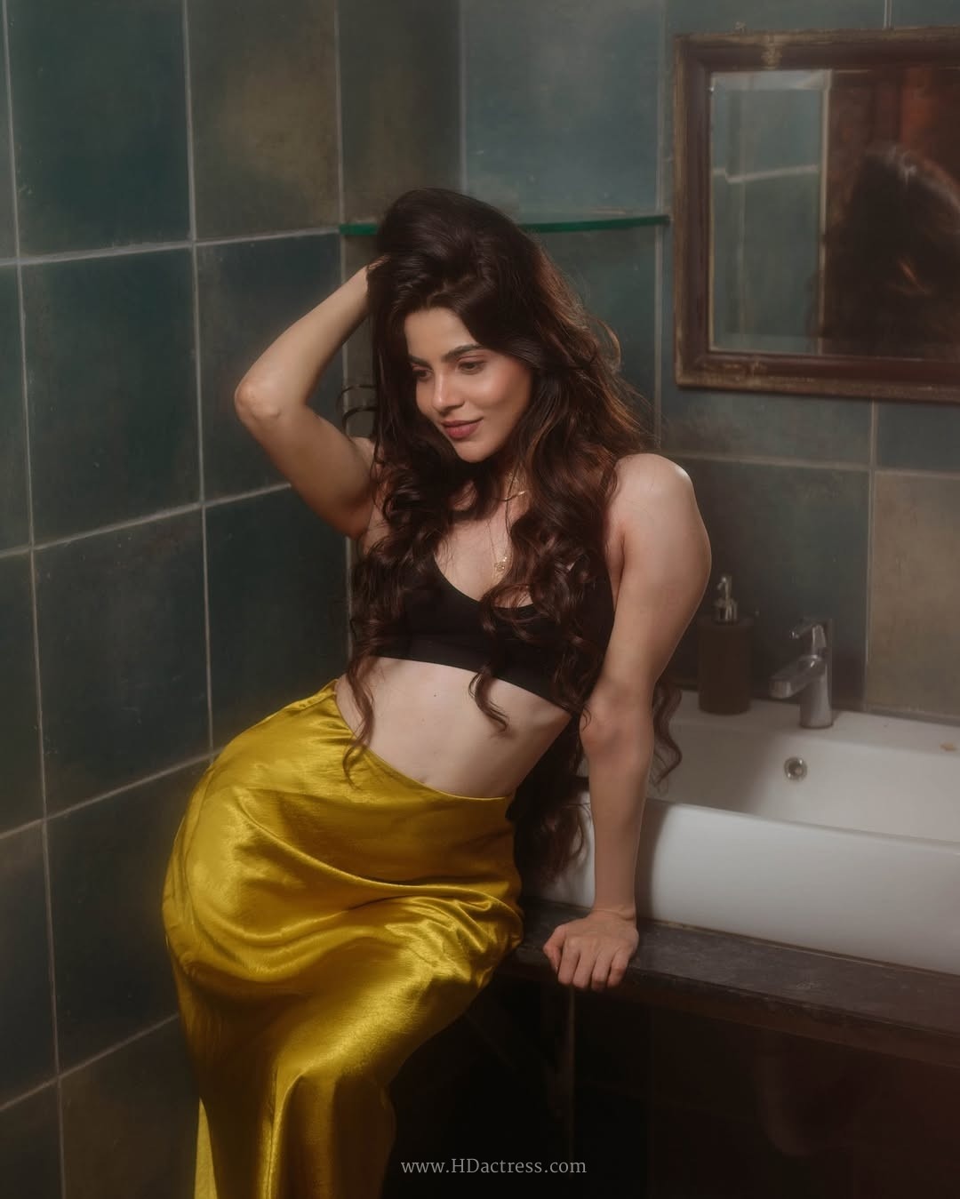 Divya bharathi’s striking retro vibe poses in bold crop top and silk skirt.. - Image 19 Divya bharathi’s striking retro vibe poses in bold crop top and silk skirt.. - Image 19