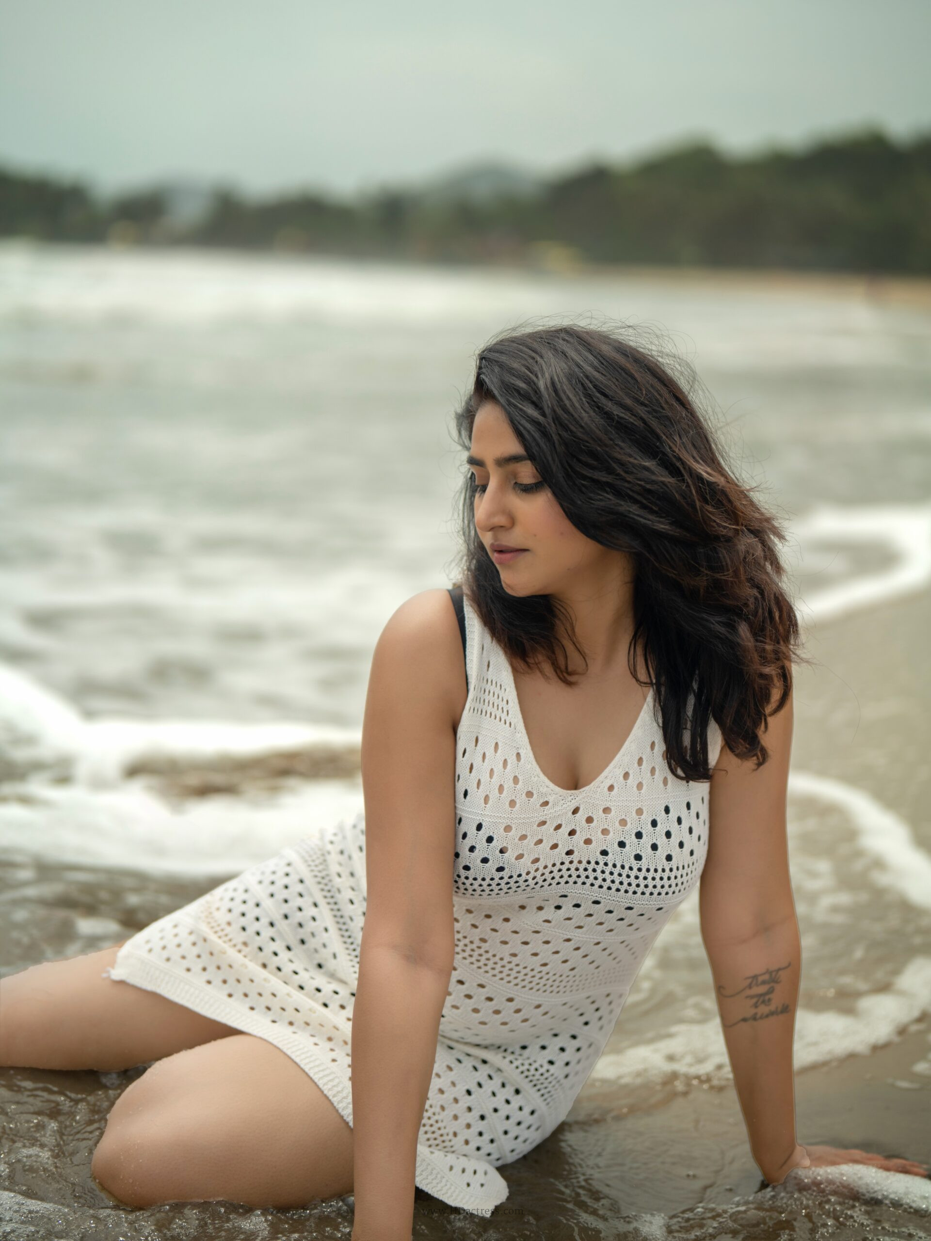 varshini sounderajan, varshini sounderajan photos, mesh cover-up dress, sleeveless v-neck dress, sheer fashion trends, tollywood actress hot photos, varshini sounderajan viral style, celebrity photoshoot updates, bold sheer outfits, anchor varshini latest images