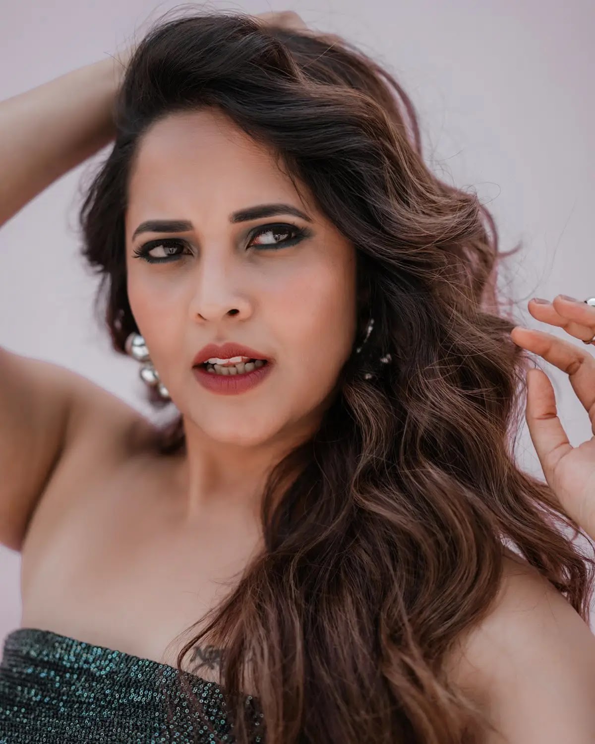 Anasuya Bharadwaj Wearing Green Sleeveless Gown | HDactress.com - Image 1