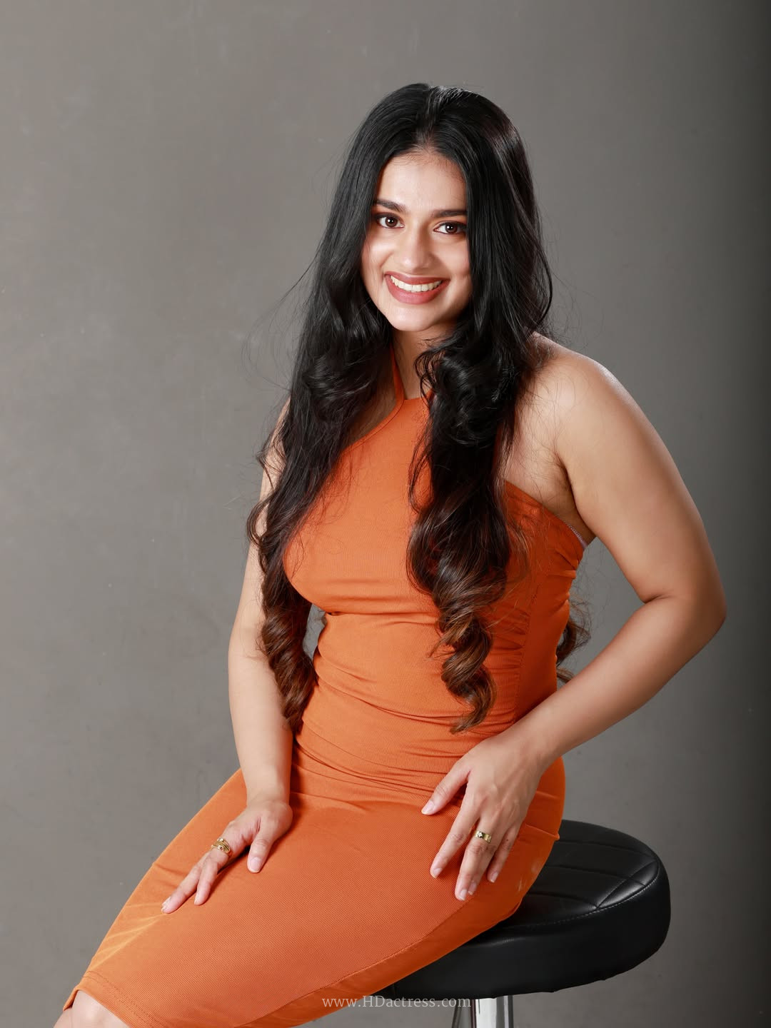 Malayalam Actress Nayanthara Chakravarthy Photos In Orange Gown - Image 1