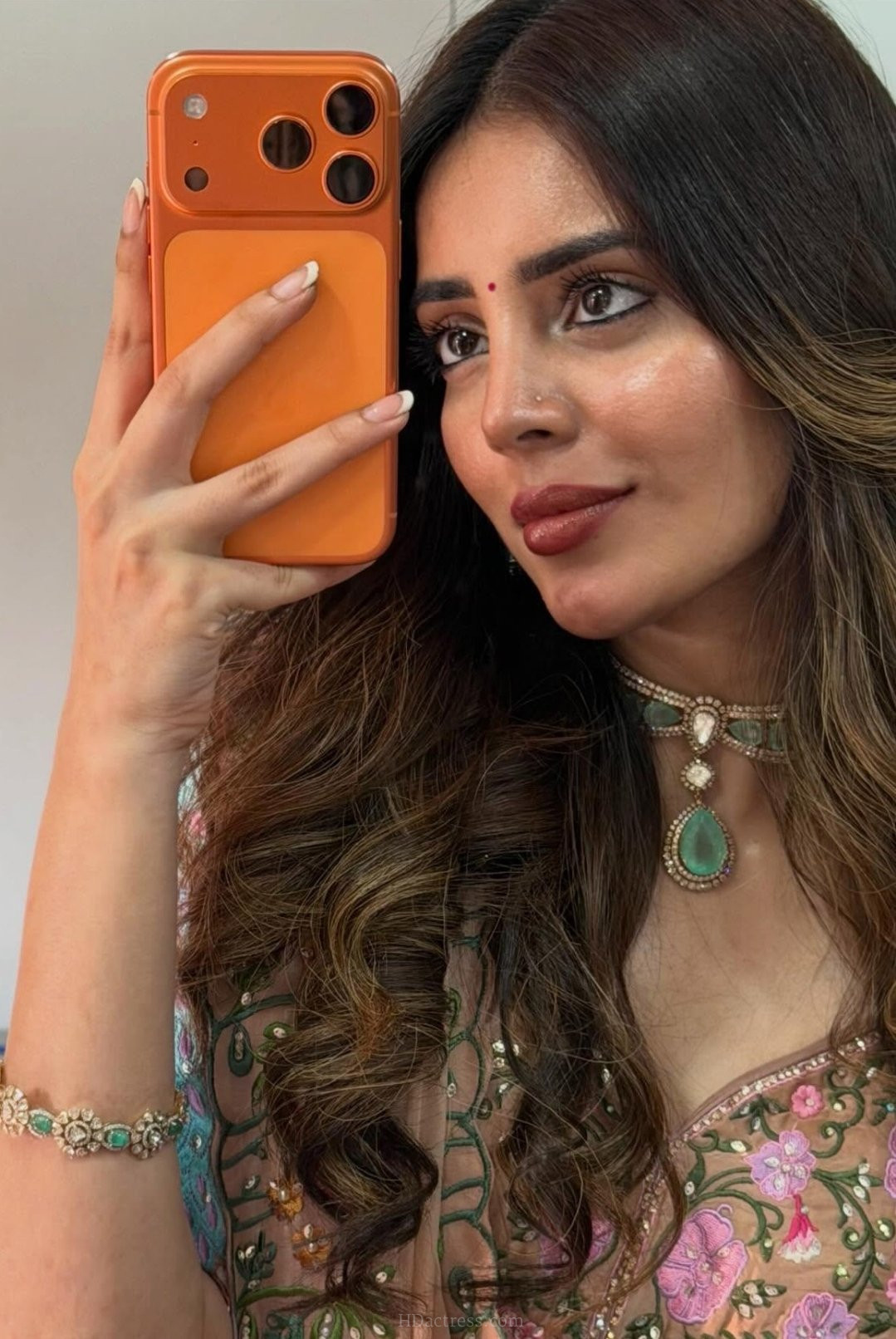 Kushita Kallapu posing elegantly for her high-fashion viral internet photoshoot.