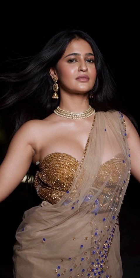 Prakriti Pavani viral pictures, busty Indian actress, sheer saree fashion, sleeveless blouse trends, celebrity style, hot saree photos, Prakriti Pavani updates, bold ethnic wear.