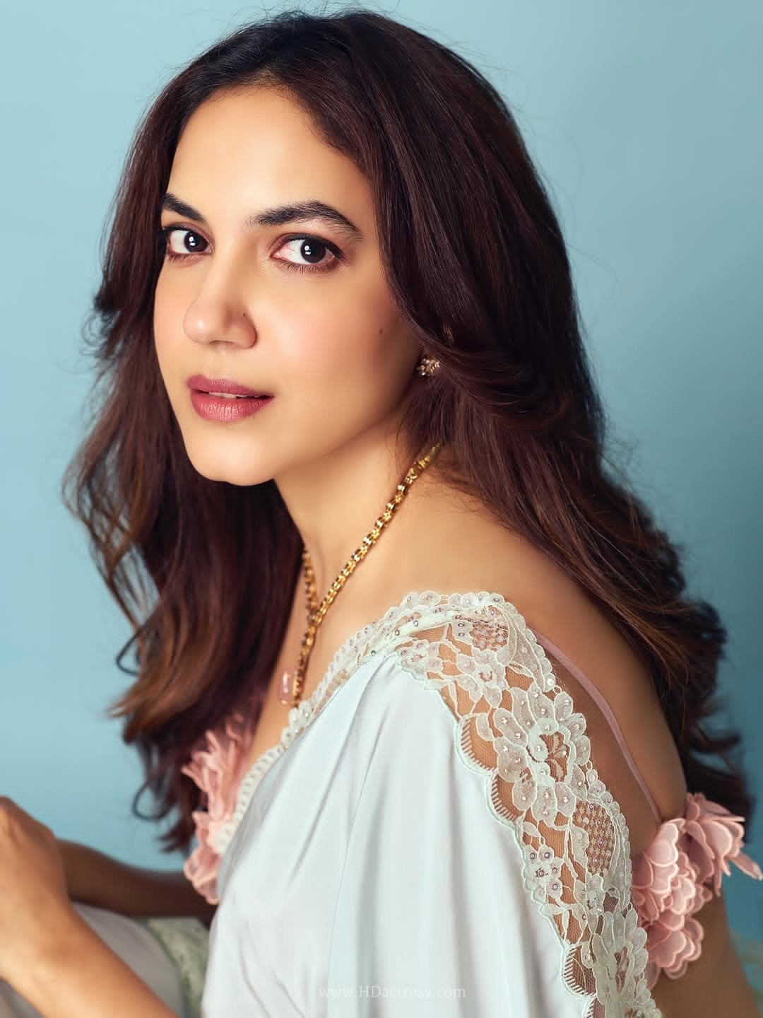 Ritu Varma looking incredibly sultry in a designer saree with a dramatic, alluring facial expression during a viral photo session.