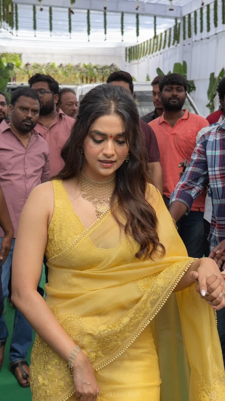 South actress Keerthy Suresh looking glamorous in a sheer transparent saree and a modern sleeveless blouse during a viral photoshoot.