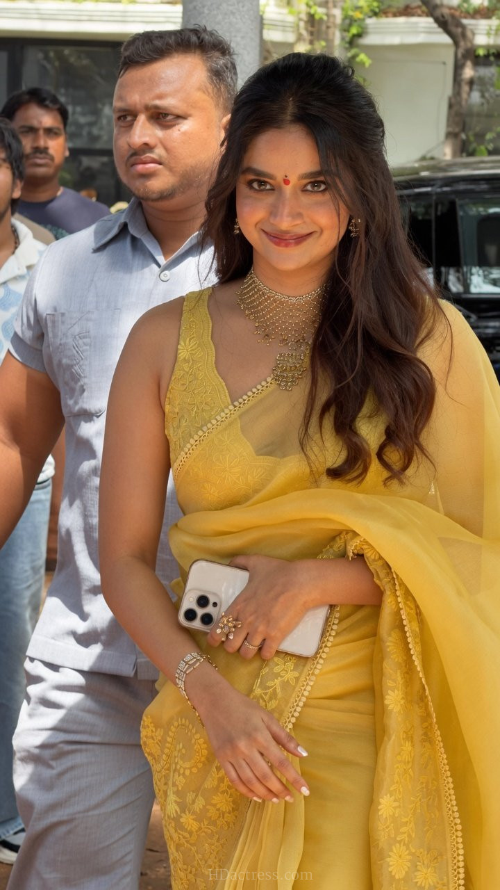 Keerthy Suresh, transparent saree, sleeveless blouse, ethnic fashion, celebrity style, sheer saree photos, viral look