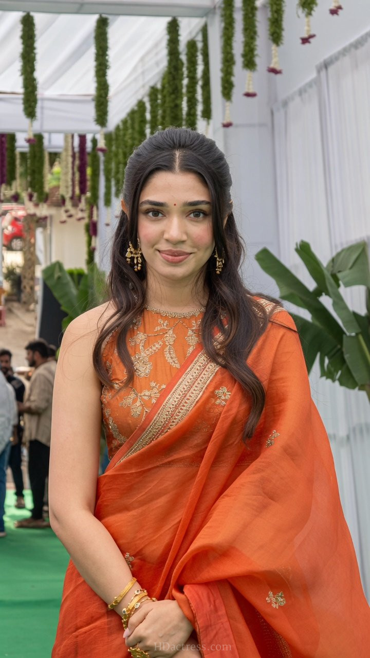 Close up shot of actress Krithi Shetty wearing a low-waist ethnic lehenga that perfectly highlights her toned midriff.