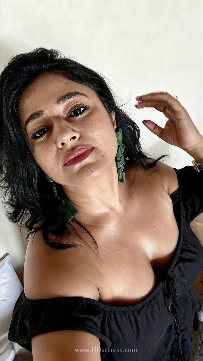 Poonam Bajwa Glamour in Deep Neck Strapless Gown Selfie
