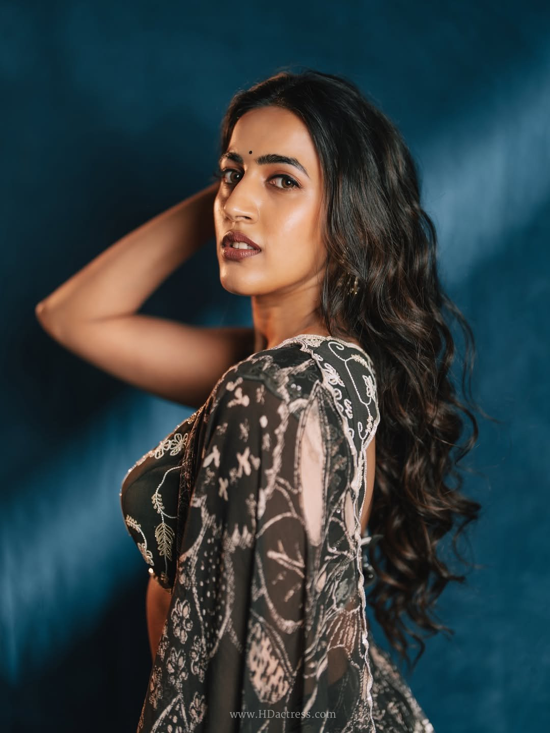 Tollywood star Niharika Konidela exuding bold elegance in a sheer and silk black traditional ensemble.
