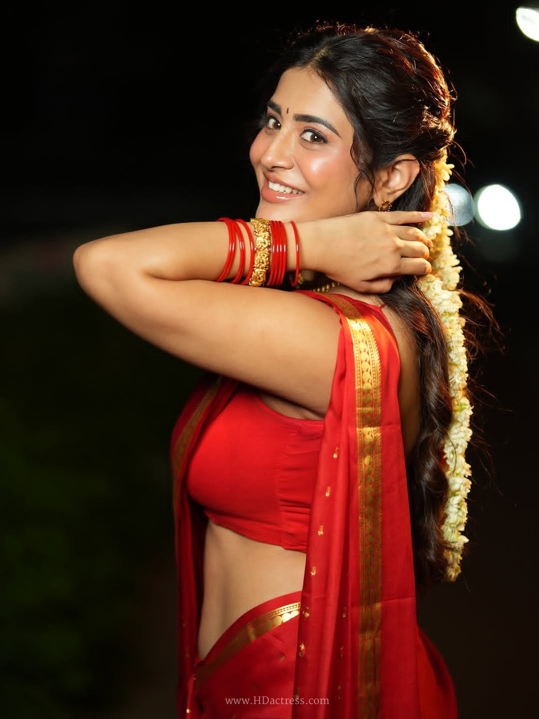 Rashi Singh, red saree photos, Rashi Singh hot pics, bold ethnic look, celebrity saree photoshoot, Rashi Singh toned waist, viral actress images, Tollywood actress latest look
