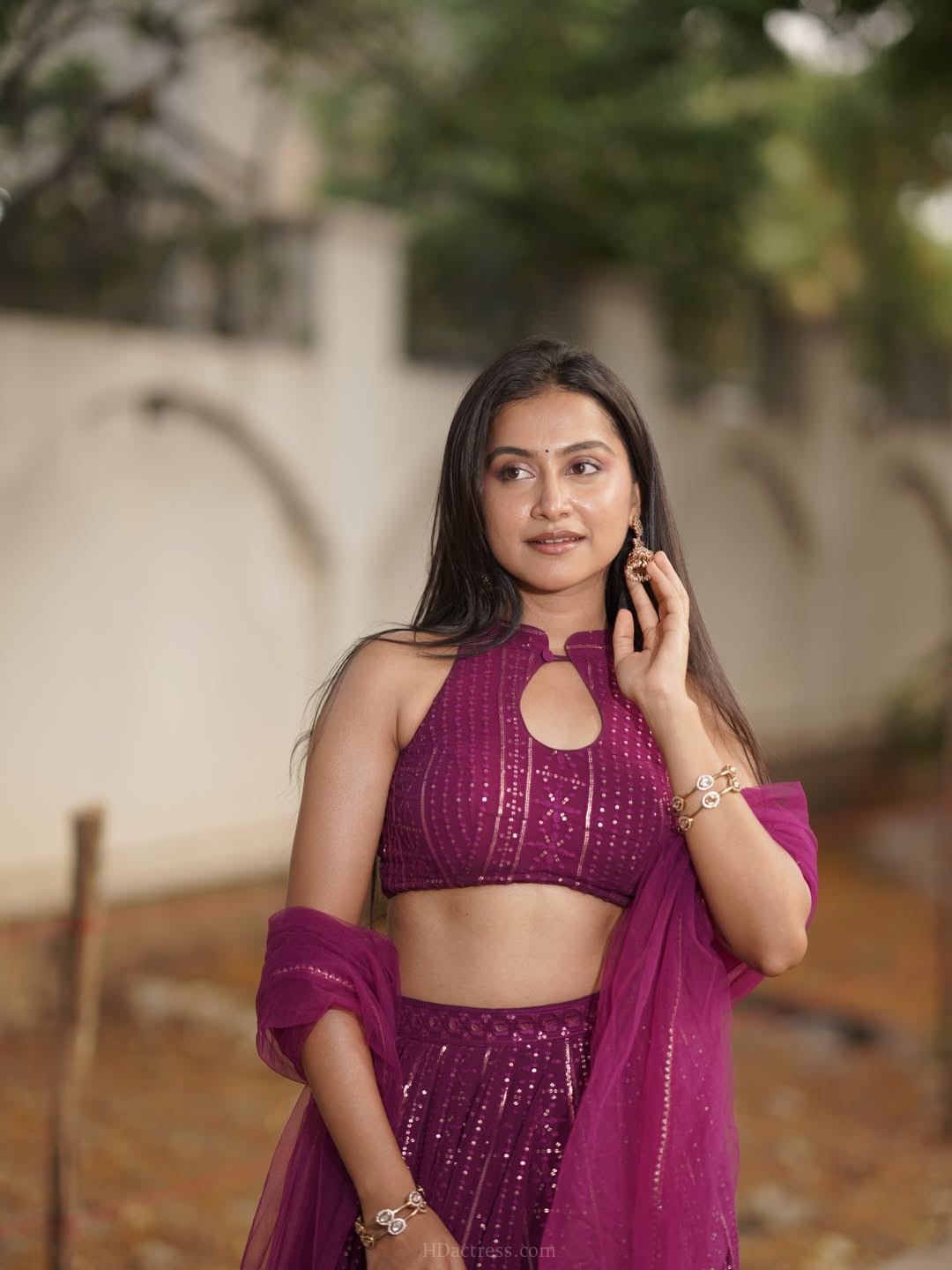 Kruthika Umashankar in magenta lehenga choli with net dupatta Kruthika Umashankar in magenta lehenga choli with net dupatta
