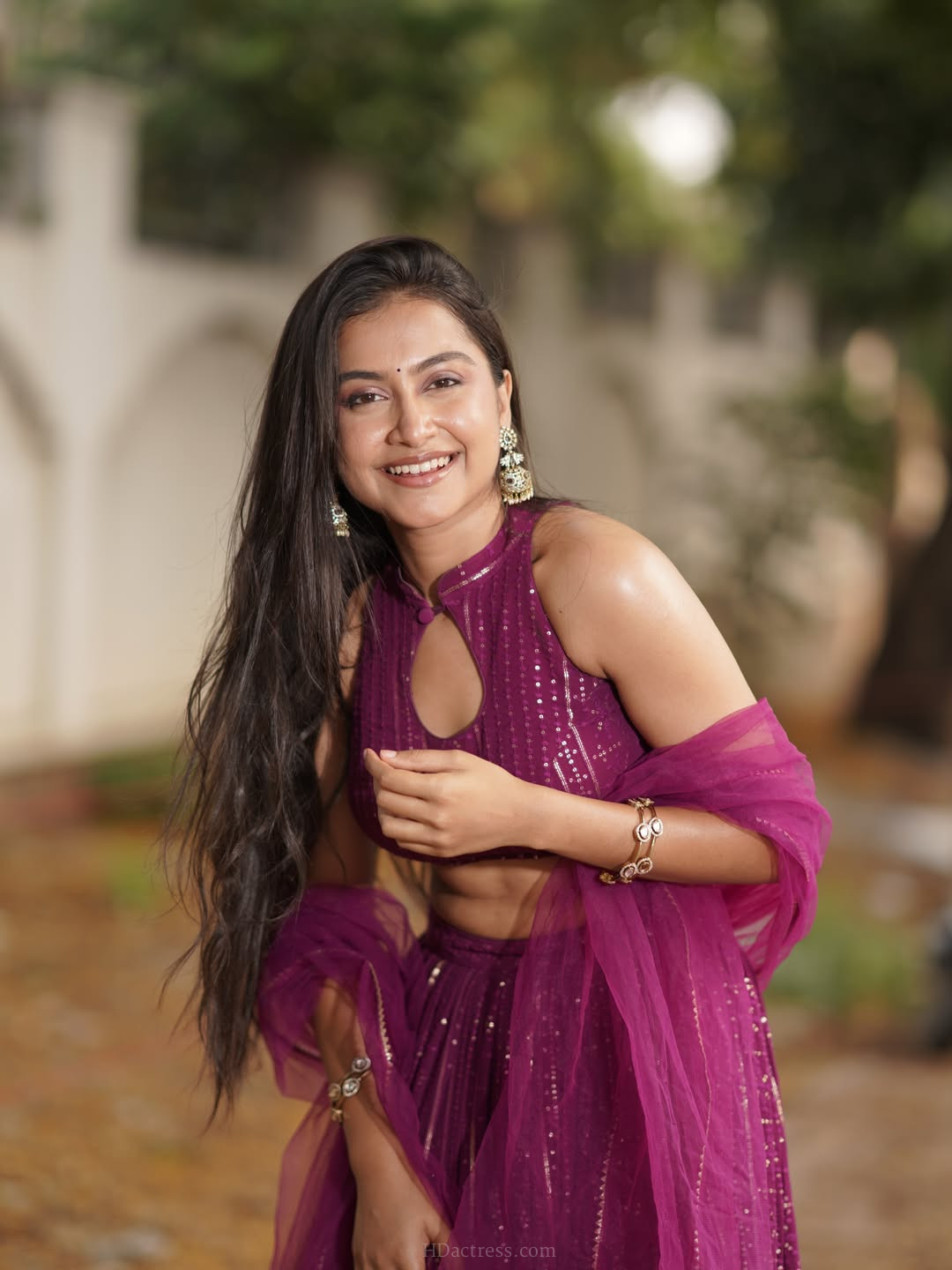 Kruthika Umashankar in magenta lehenga choli with net dupatta Kruthika Umashankar in magenta lehenga choli with net dupatta