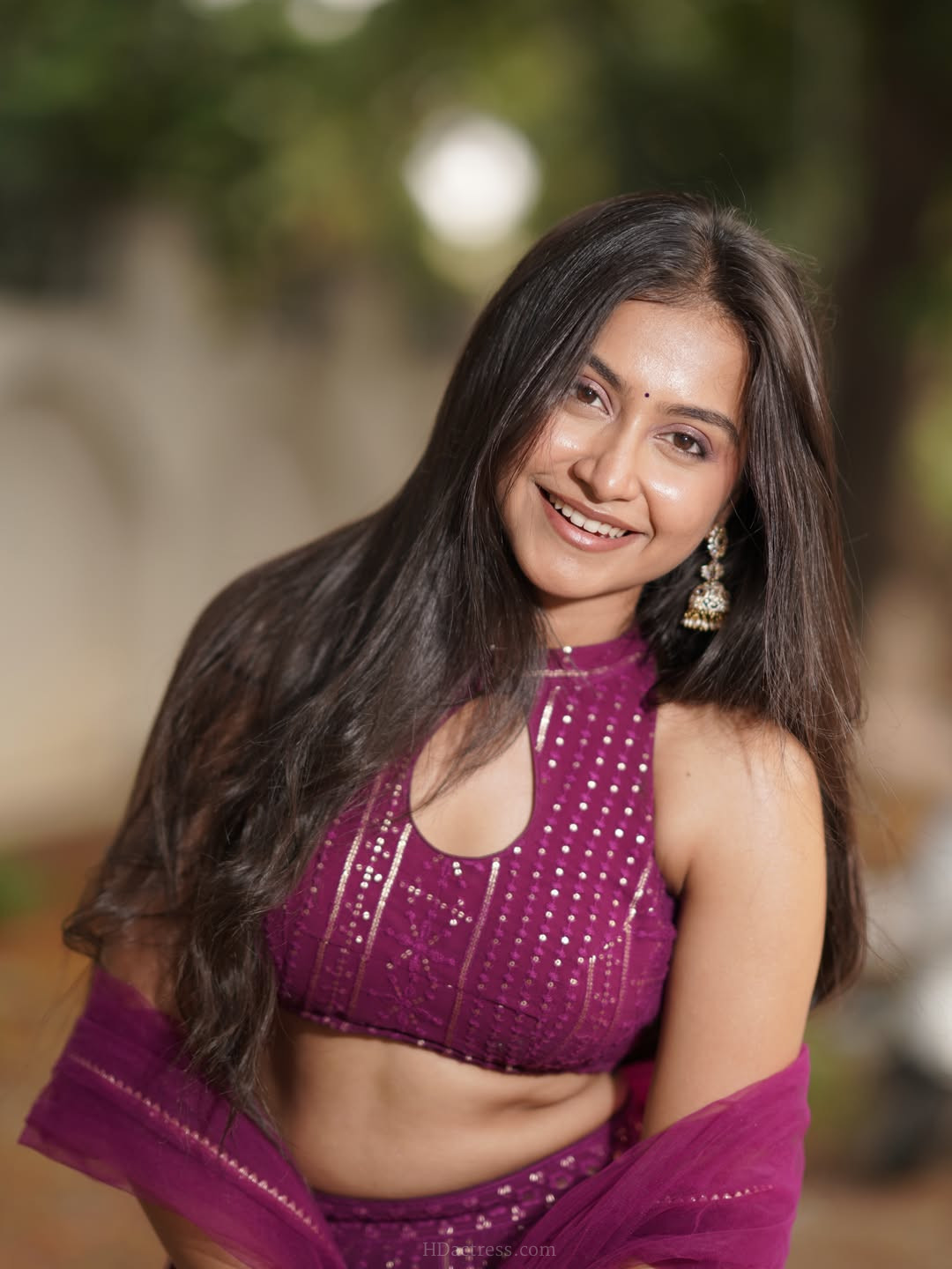Kruthika Umashankar in magenta lehenga choli with net dupatta Kruthika Umashankar in magenta lehenga choli with net dupatta