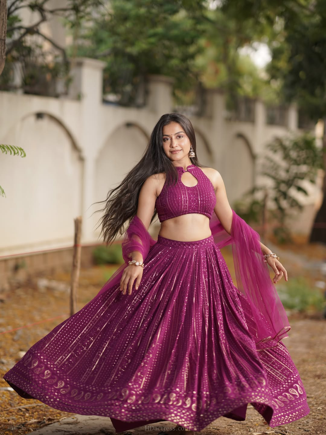 Kruthika Umashankar in magenta lehenga choli with net dupatta Kruthika Umashankar in magenta lehenga choli with net dupatta