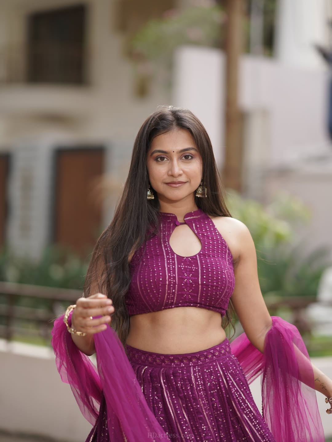 Kruthika Umashankar in magenta lehenga choli with net dupatta Kruthika Umashankar in magenta lehenga choli with net dupatta
