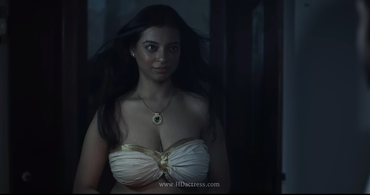 Neha Chawla posing in a glamorous, sizzling hot outfit for her latest viral photoshoot.