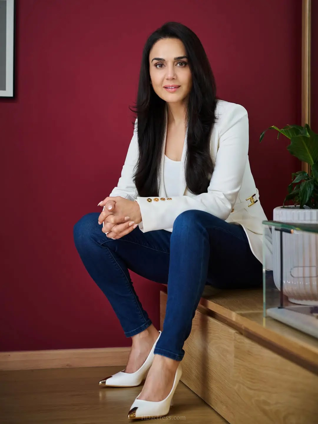 Beautiful Hindi Actress Preity Zinta Stills in White Coat Blue Jeans