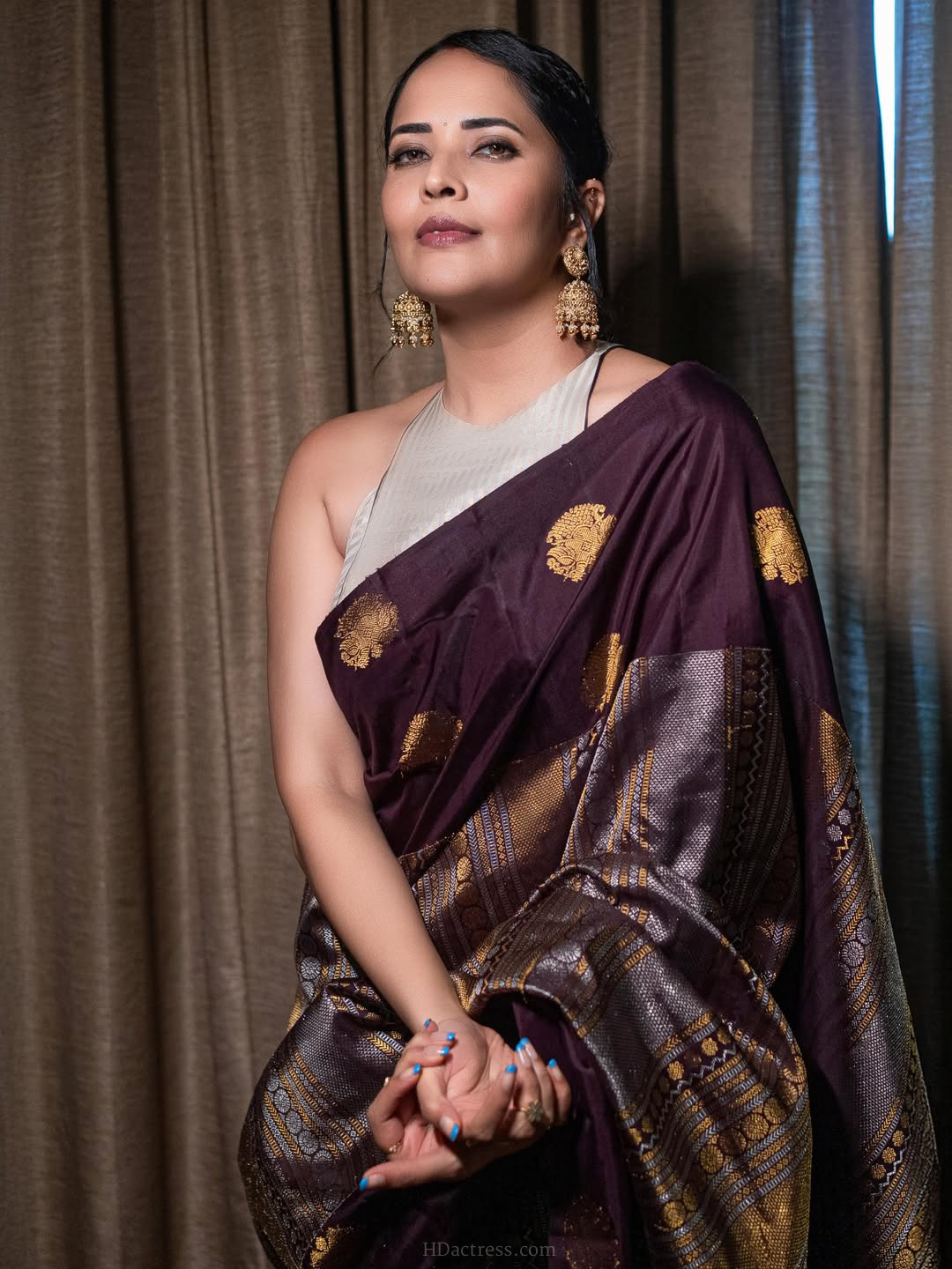 Anasuya Bharadwaj in wine purple silk saree Anasuya Bharadwaj in wine purple silk saree