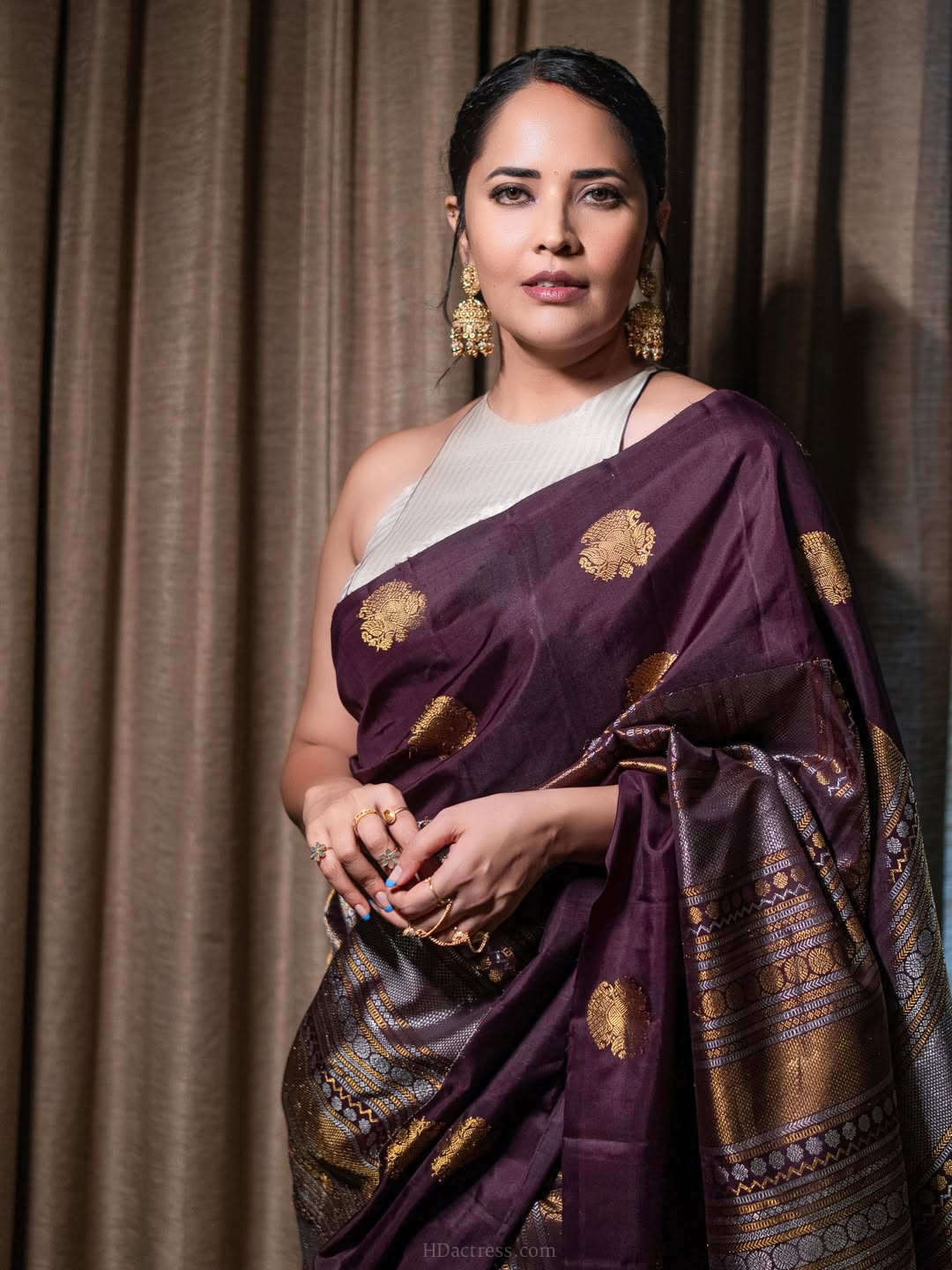 Anasuya Bharadwaj in wine purple silk saree Anasuya Bharadwaj in wine purple silk saree