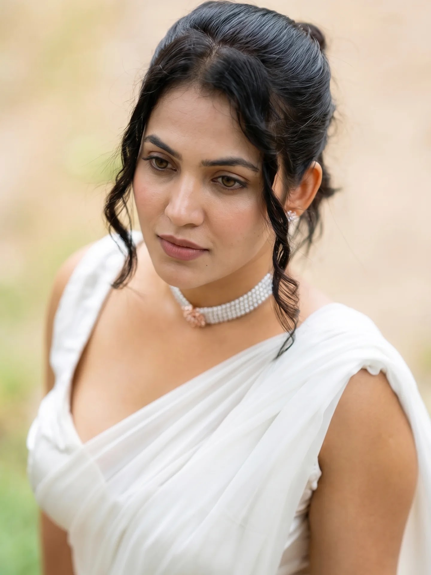 Meera in white georgette saree