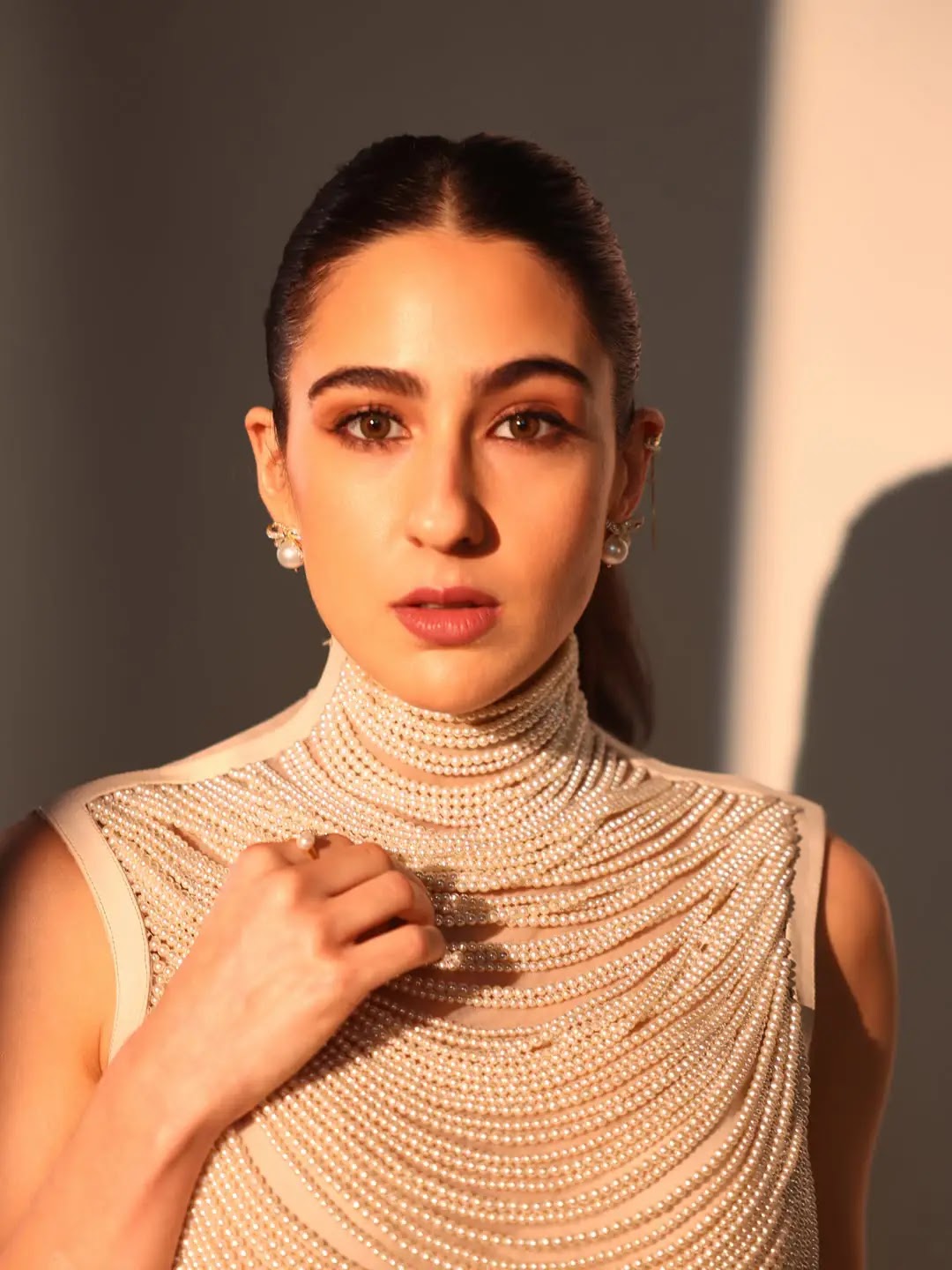 Beautiful Indian Actress Sara Ali Khan Stills In White Coat - Image 1