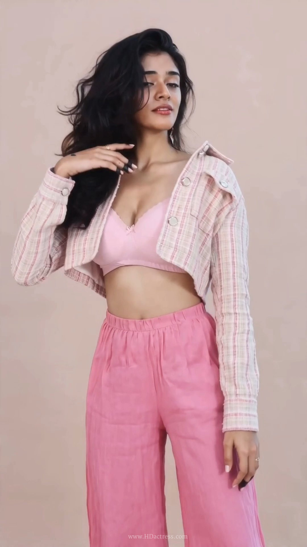 Tanvi Dixit in a Sensual Pink Bra and Tailored Coat