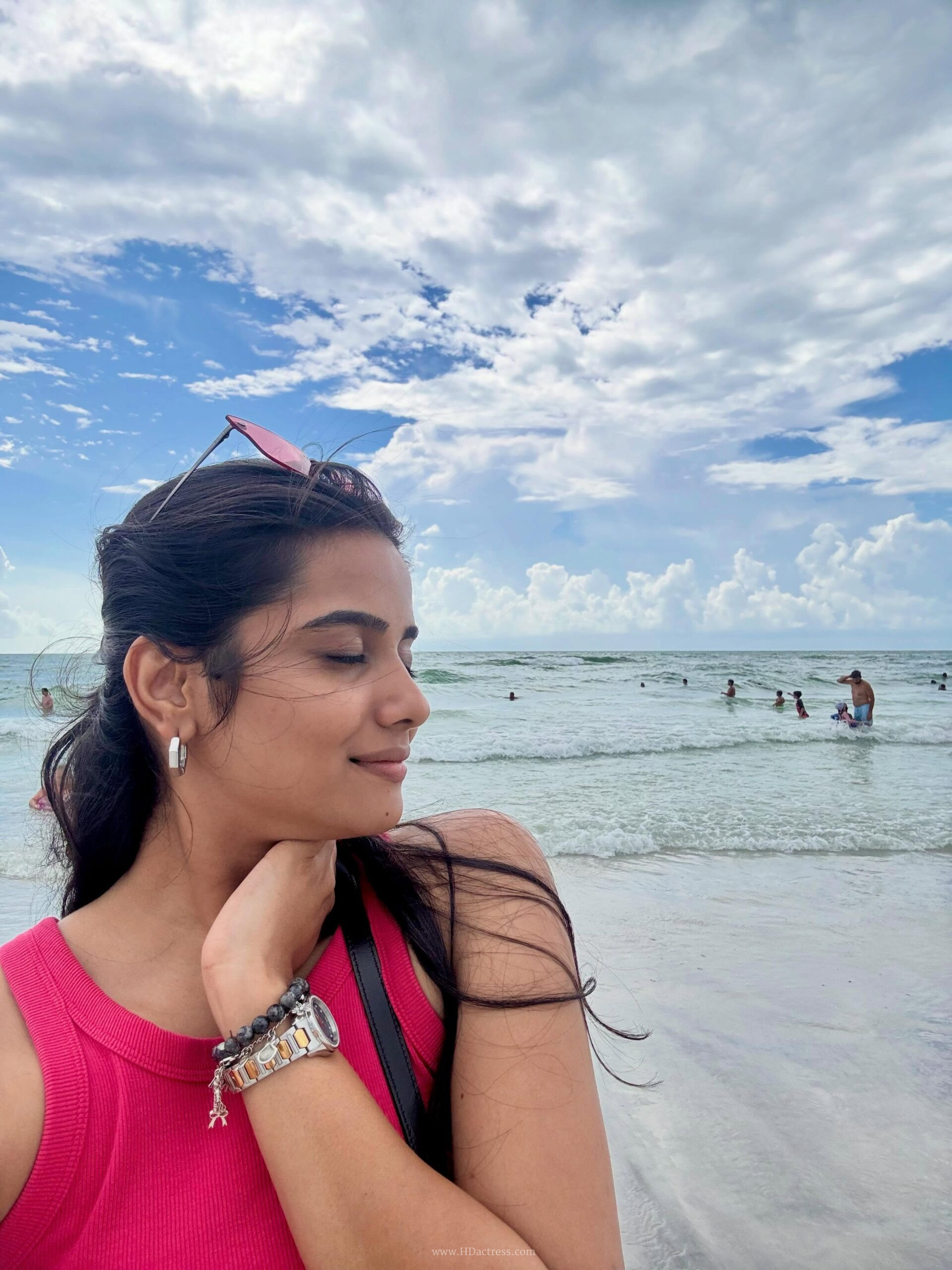 Sri Gouri Priya Sets the Screen Ablaze in a Bold Red Tank Top Beach Shoot
