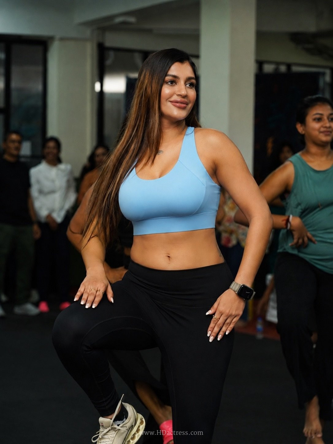 Yashika Aannand rocking a vibrant sports bra during her gym workout showing off her fit midriff.