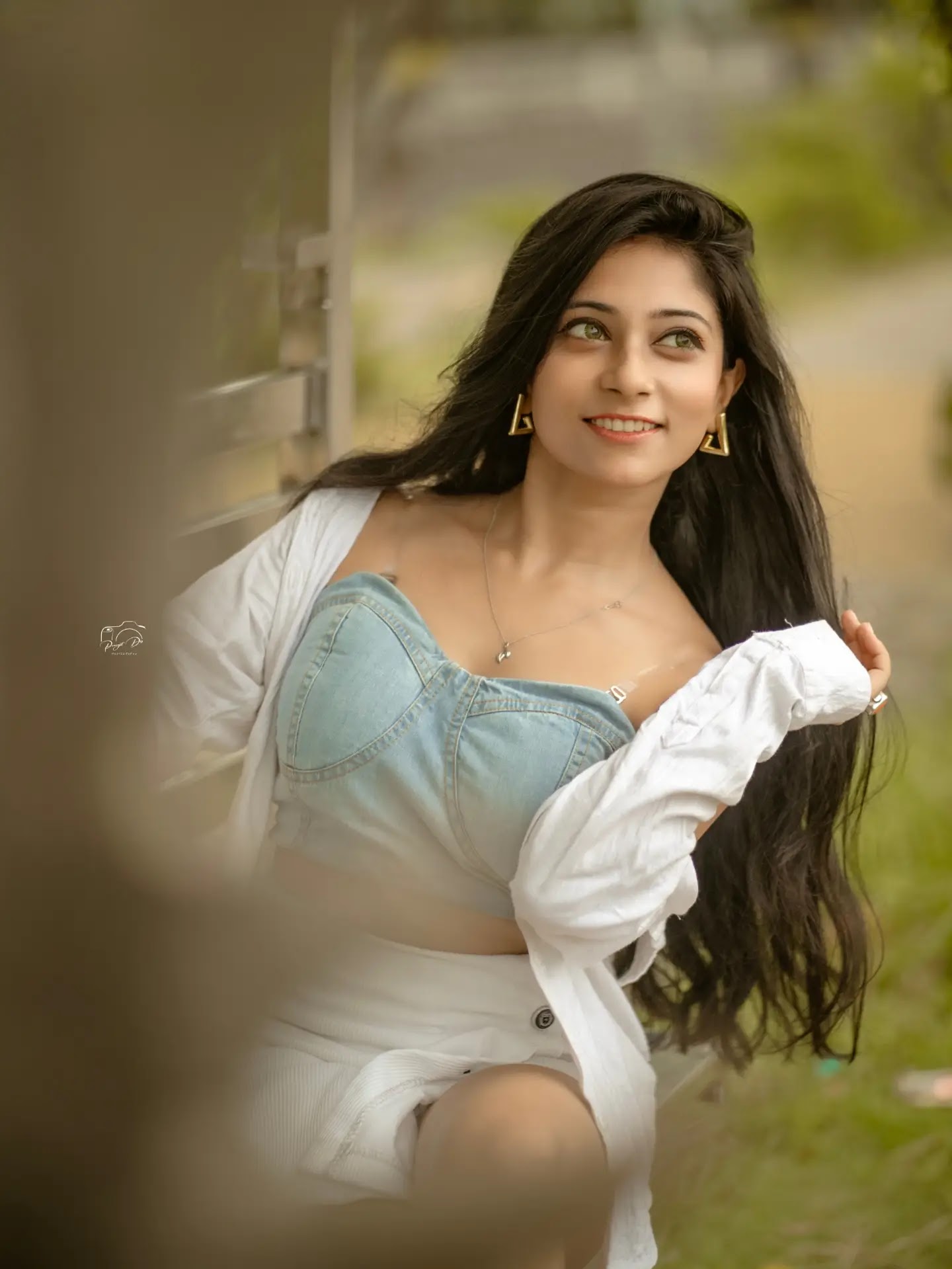 Puja Chakraborty in denim crop top and white wrap skirt Puja Chakraborty in denim crop top and white wrap skirt