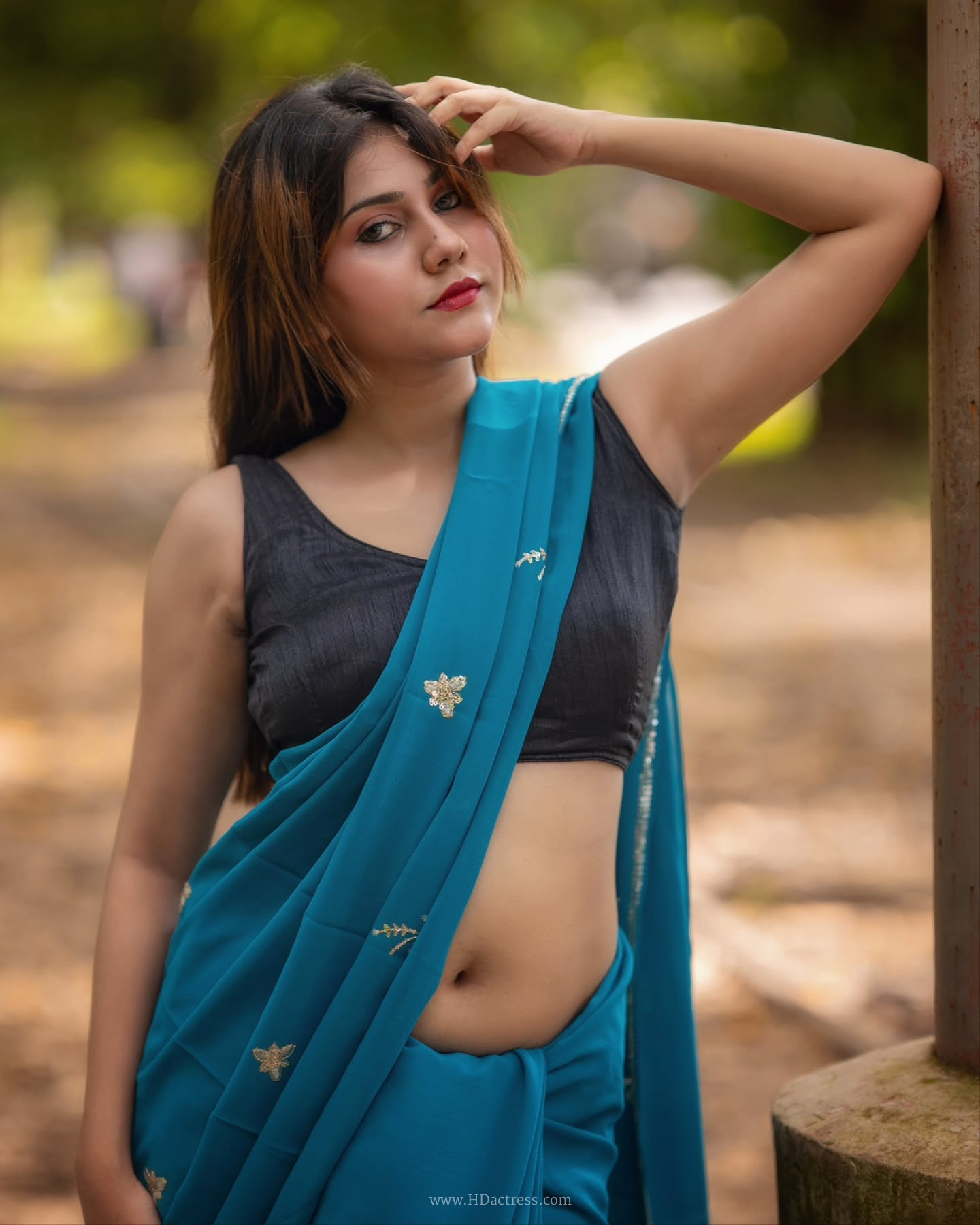 Payel Mondal in peacock blue georgette saree