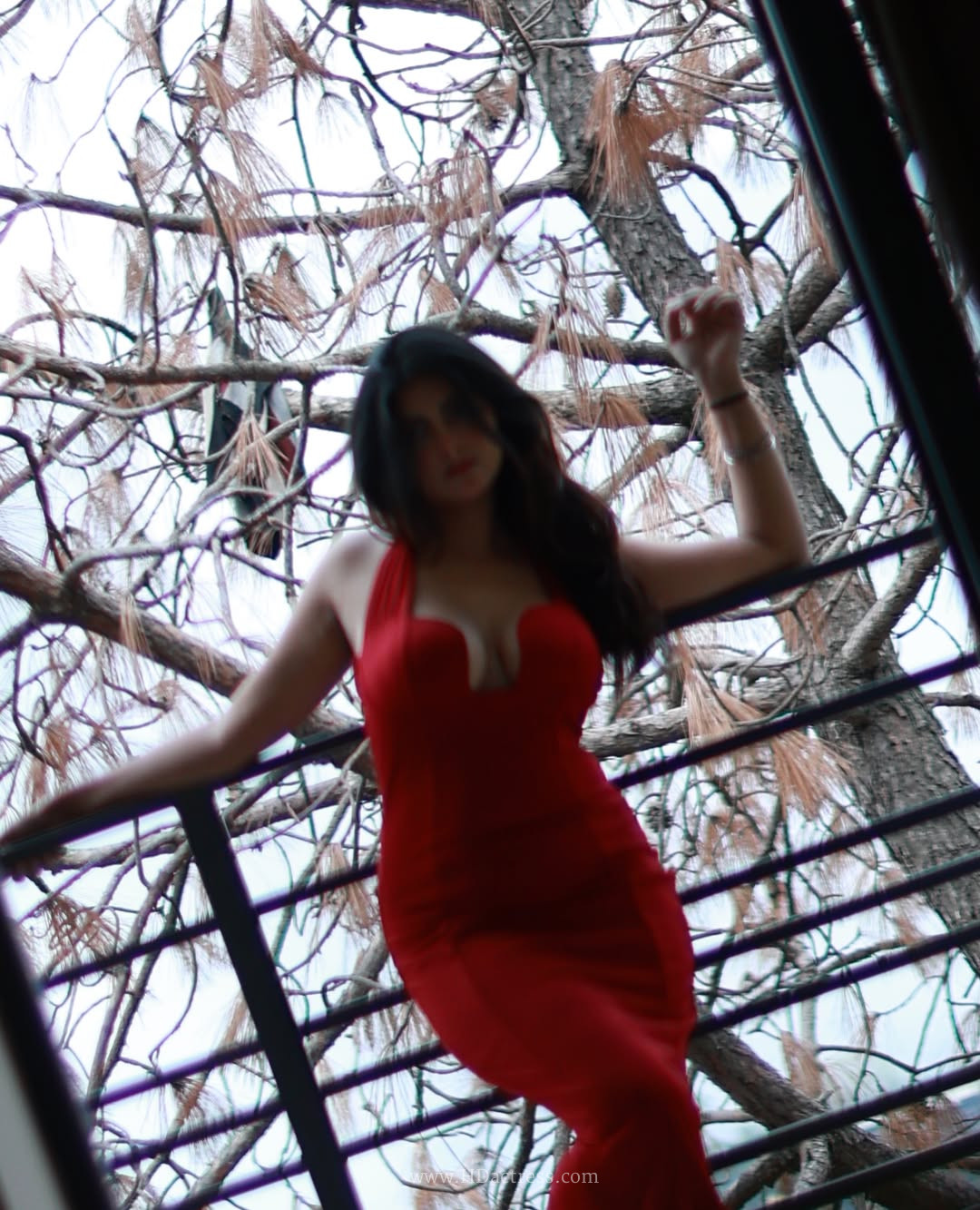 Rivaa Jadoun in vibrant red bodycon dress Rivaa Jadoun in vibrant red bodycon dress