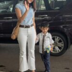 Kajal Aggarwal did some cute posing with her son before leaving at the airport. ♥️#KajalAggarwal
