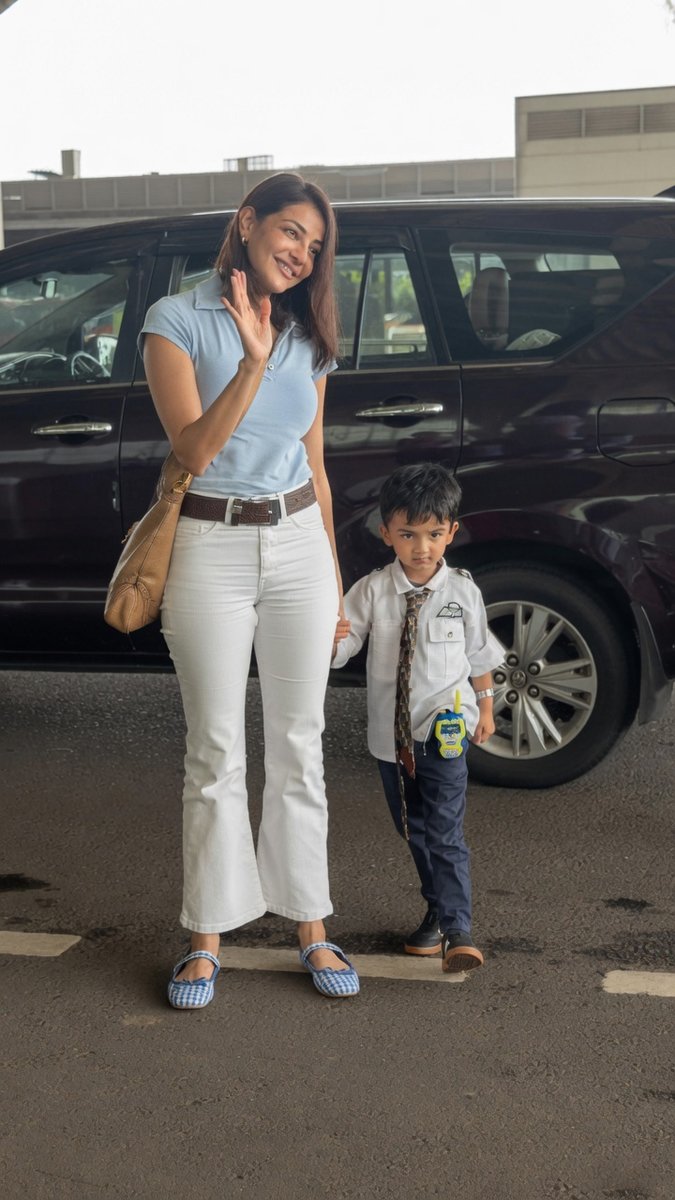 Kajal Aggarwal did some cute posing with her son before leaving at the airport. ♥️#KajalAggarwal